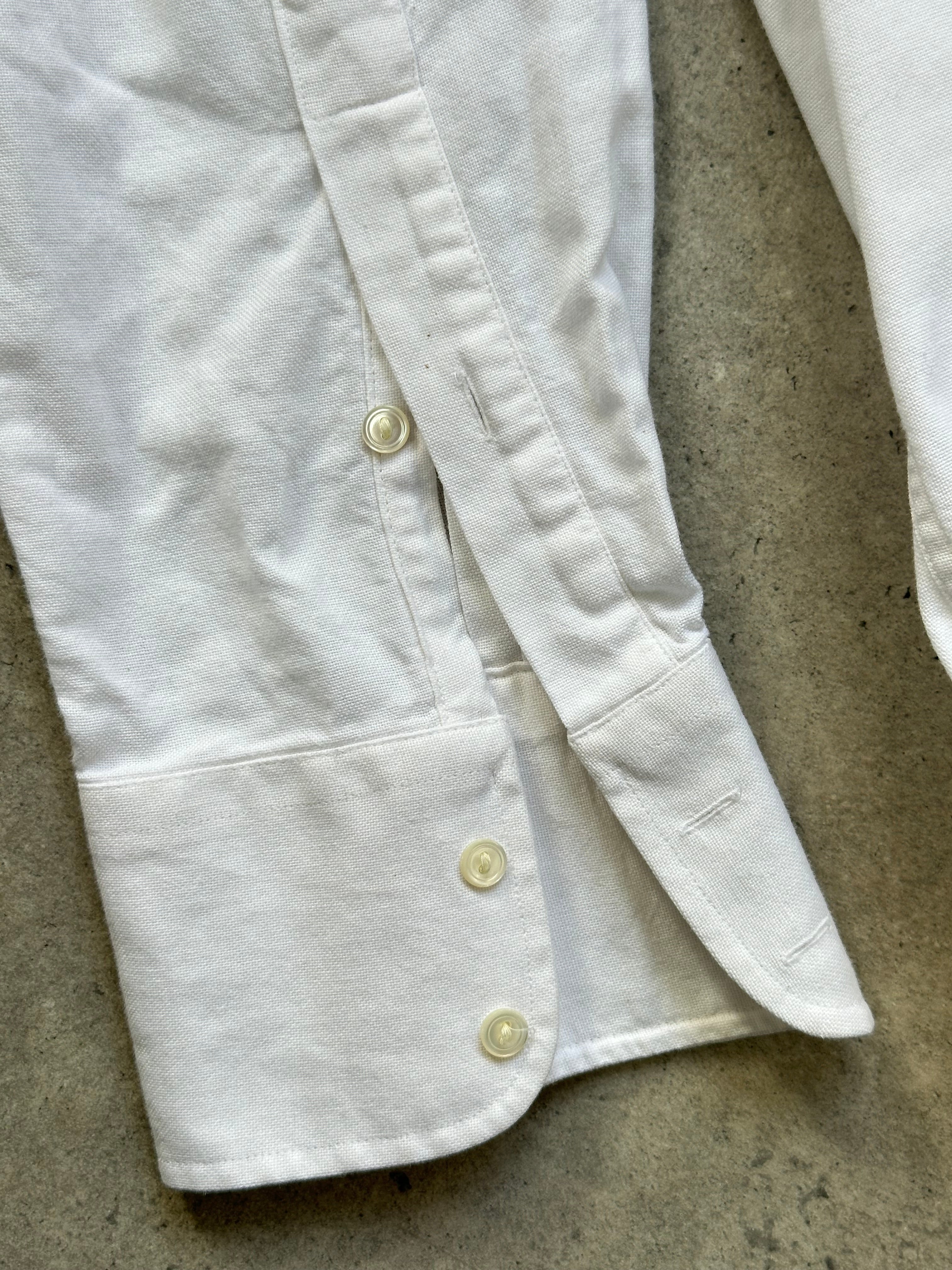 Yves Saint Laurent 1990s pure cotton shirt in size L, featuring classic design and soft fabric, displayed flat on a neutral background.