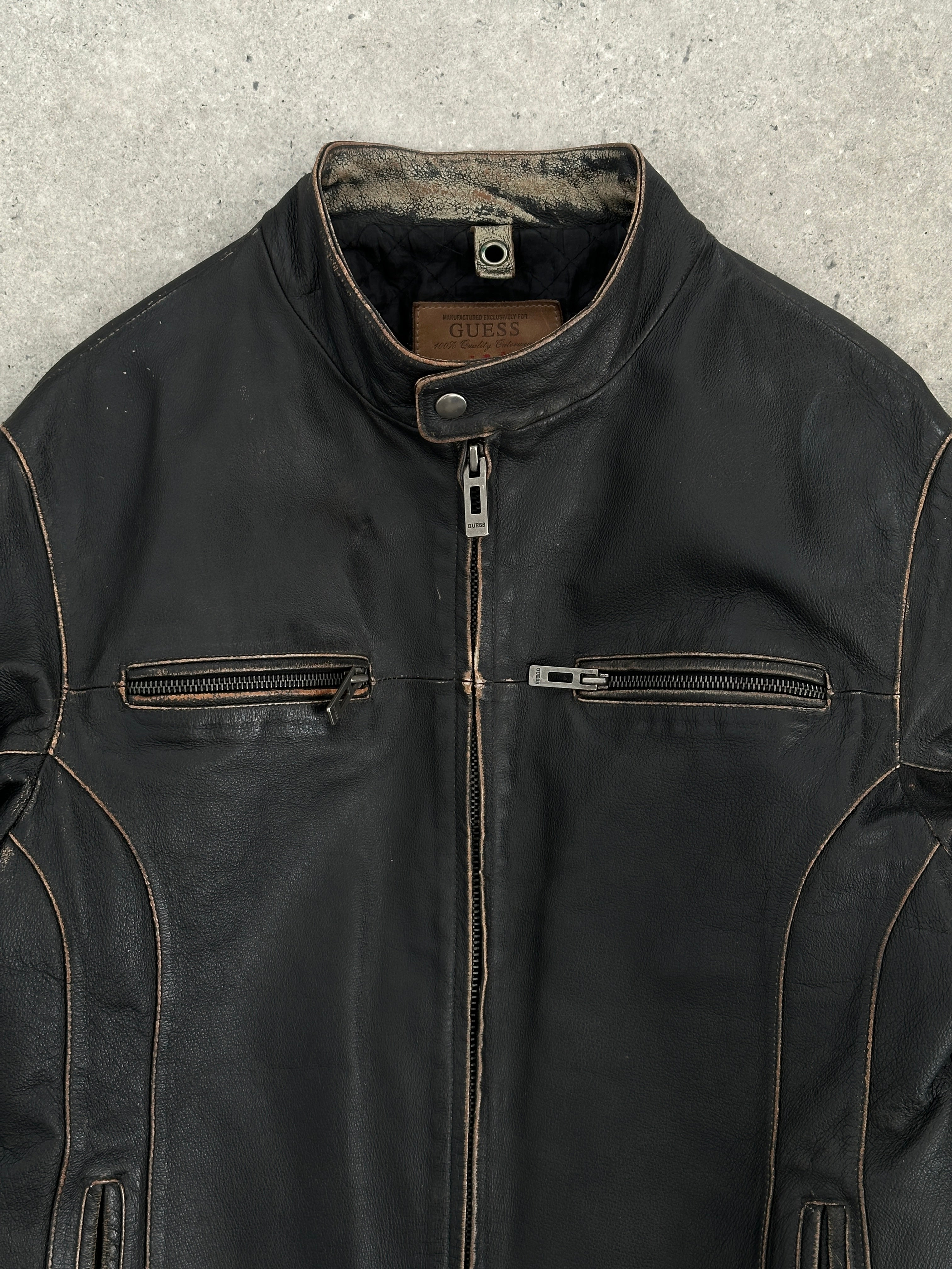Guess distressed leather moto jacket in size L, featuring a rugged design with silver hardware and a classic biker style.