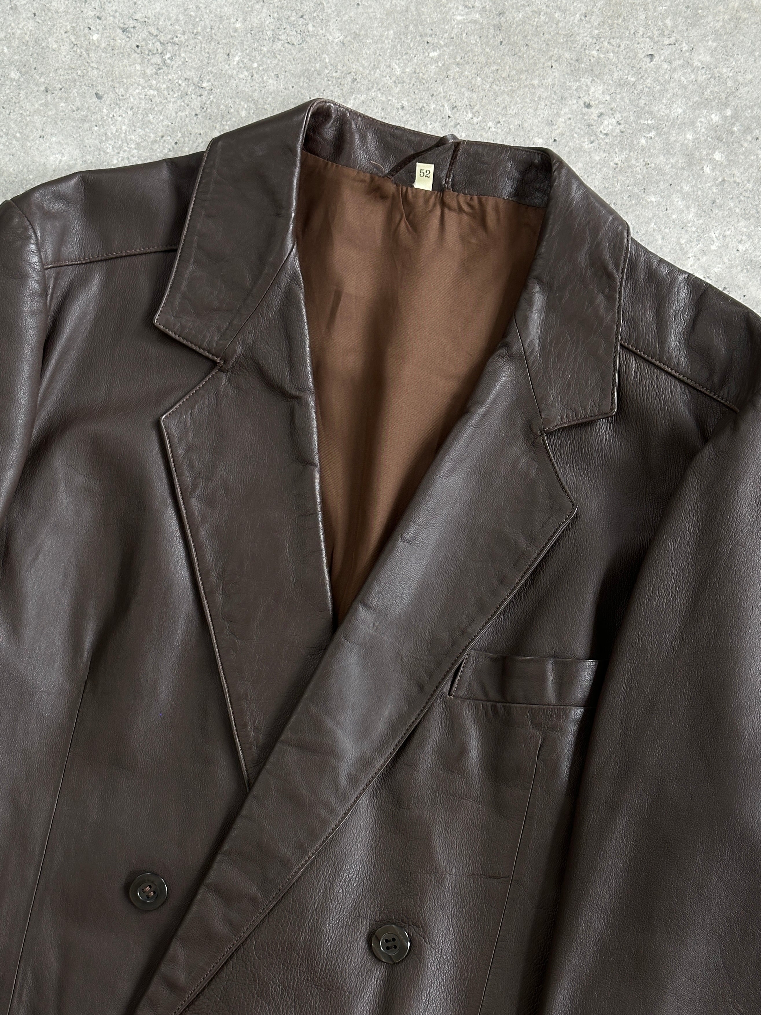 Vintage double-breasted leather blazer jacket in size L with classic design and button details, displayed on a neutral background.