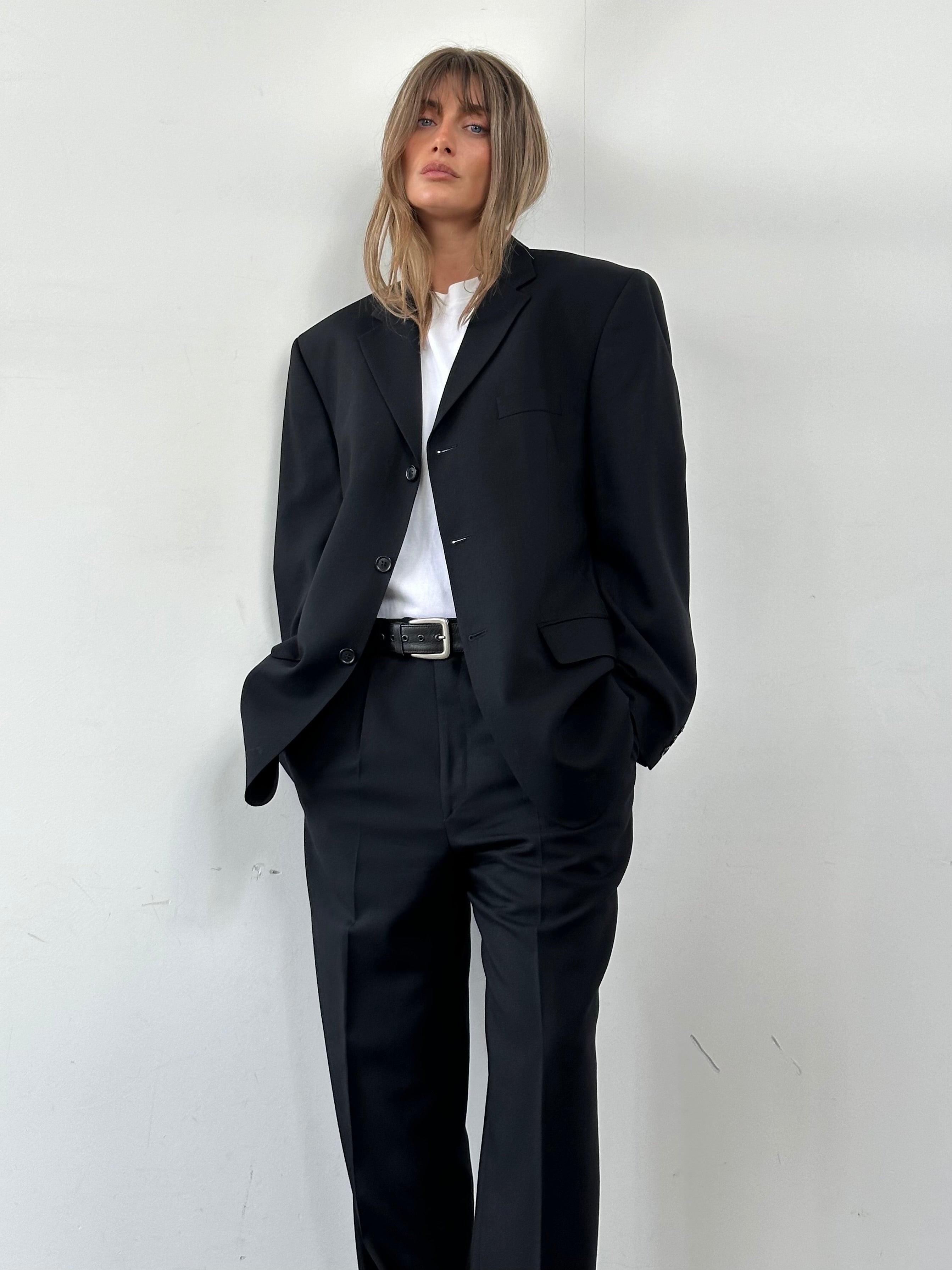 Pierre Cardin pure wool single-breasted suit jumpsuit in size 40R/W33, tailored fit with classic lapel and front button closure.