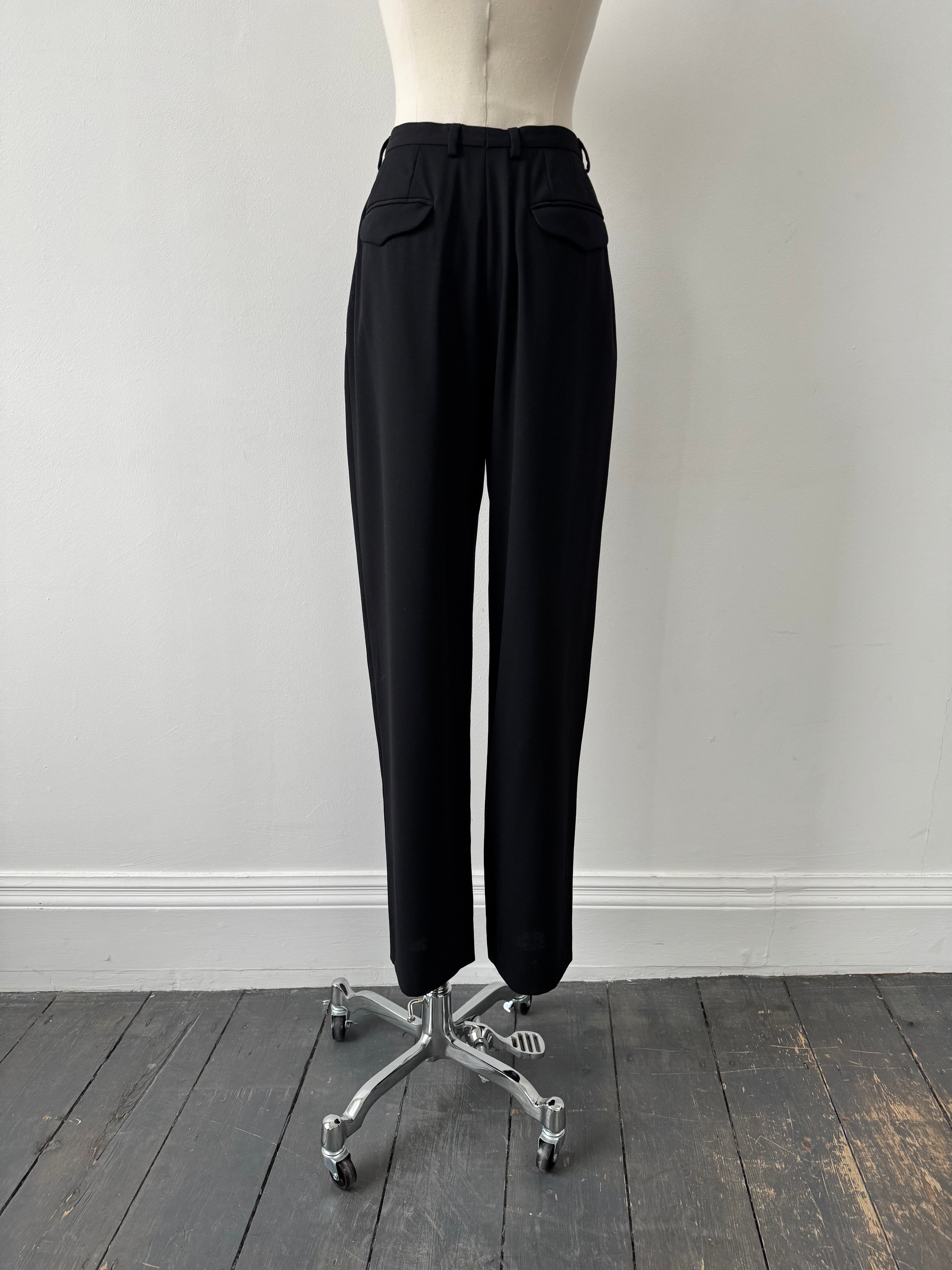 Giorgio Armani 1990s wool tailored trousers with straight-leg fit, W24, in a classic neutral color, displayed on a hanger.