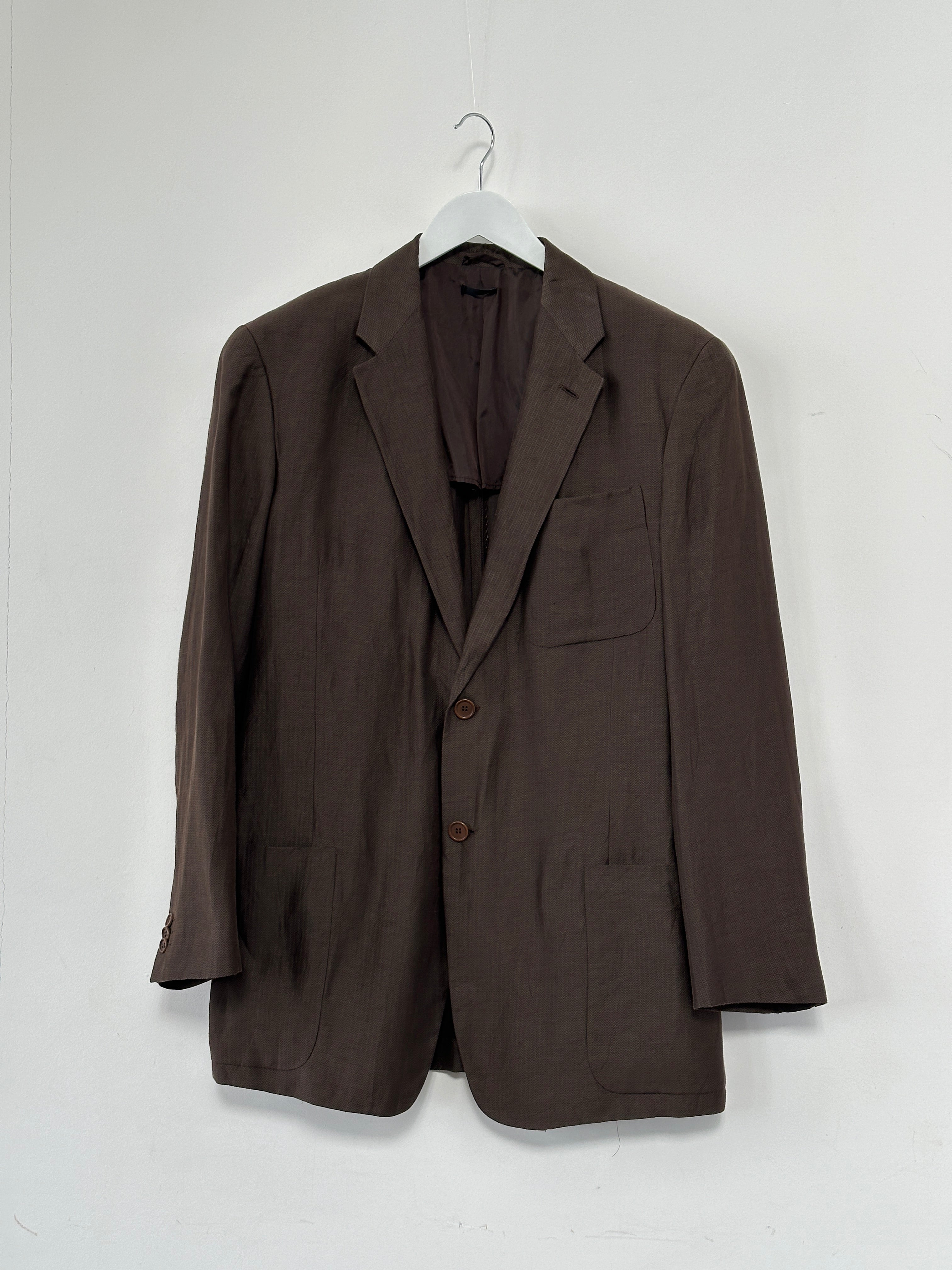 Giorgio Armani Black Label 1990s silk linen blazer in black, size 42R/XL, displayed on a hanger with tailored details.