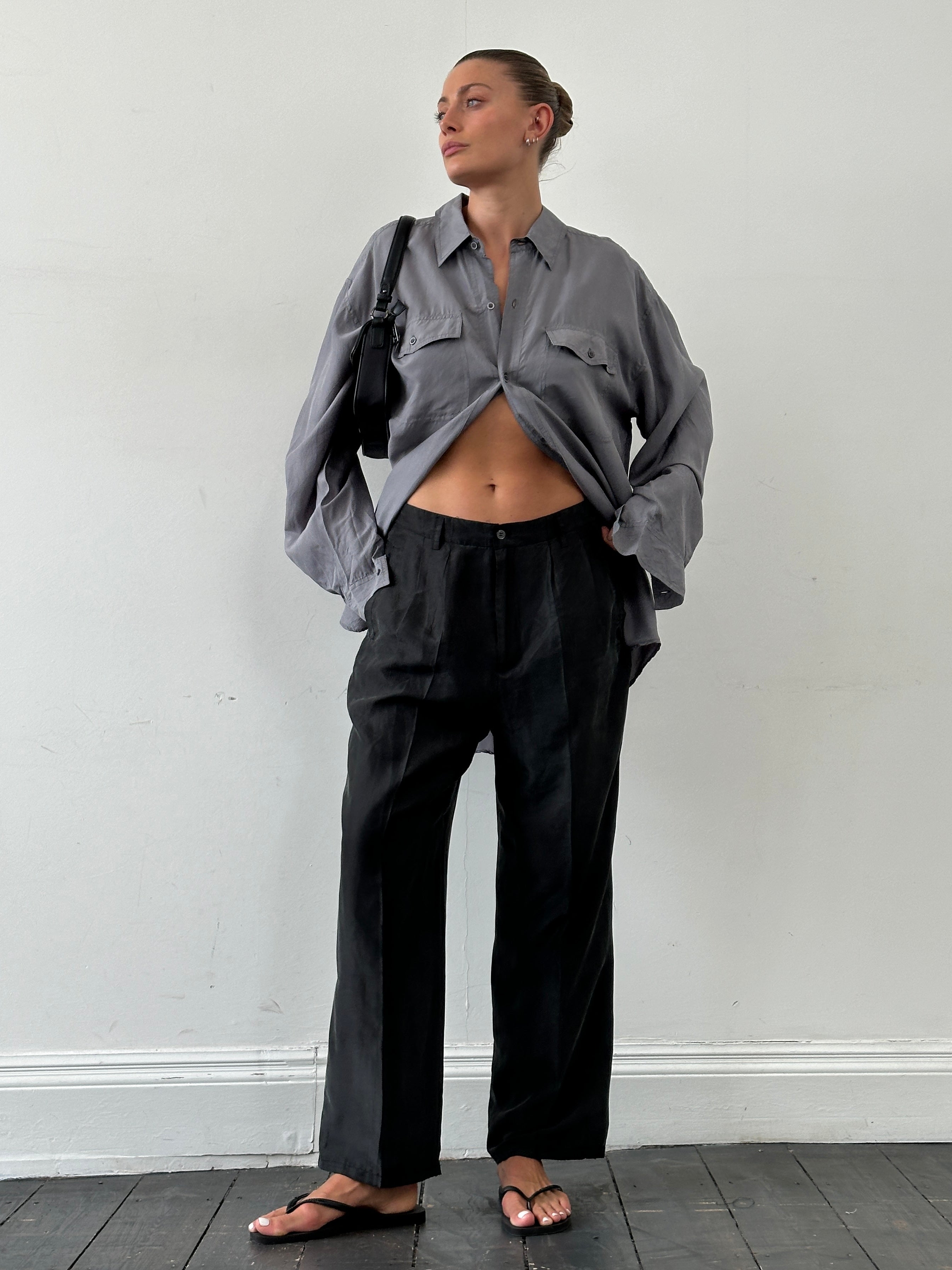 Vintage pure silk high waisted straight leg trousers in W32, showcasing smooth fabric and elegant fit.