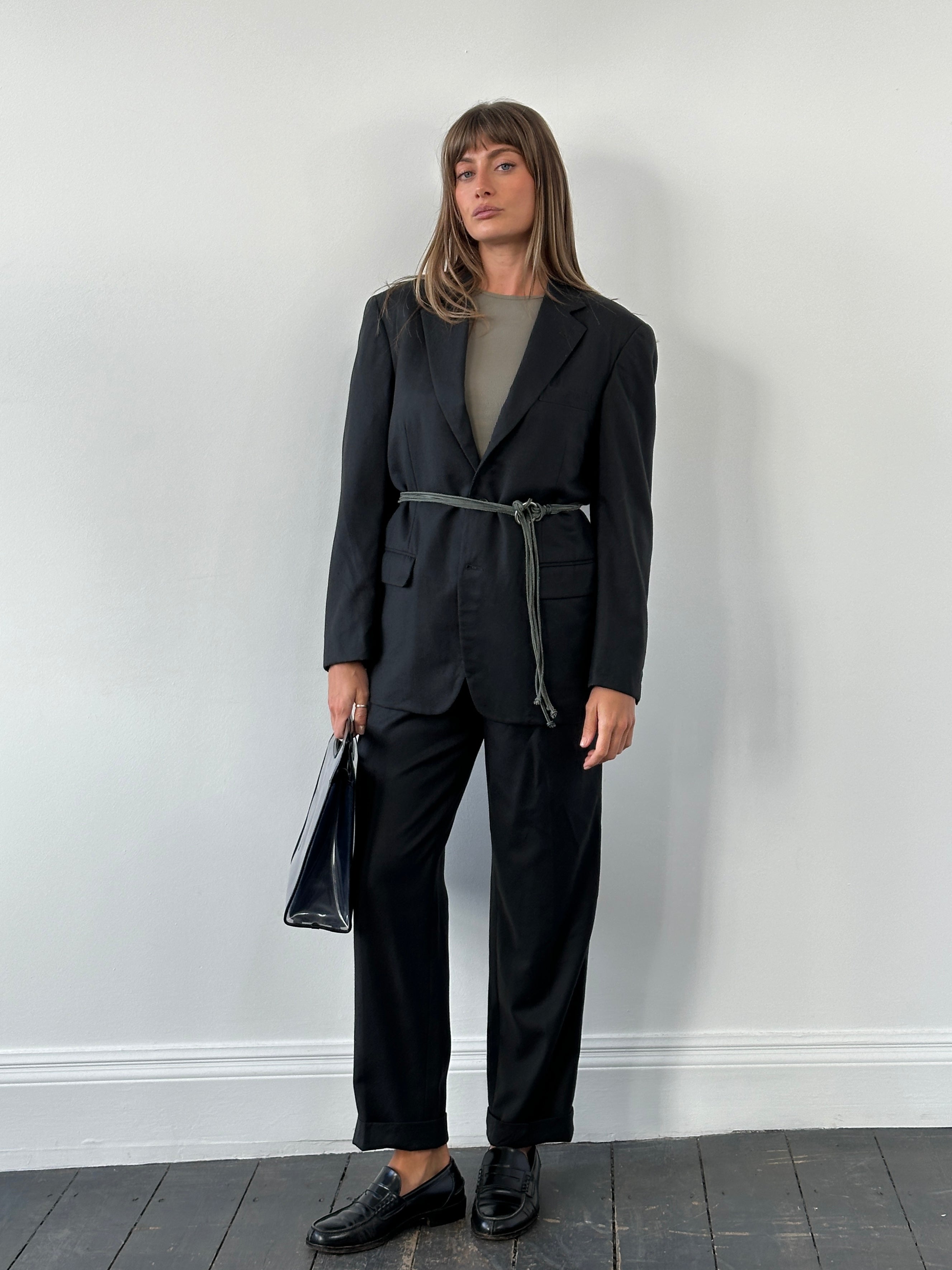 Vintage 1990s Japanese pure wool straight leg suit in size 40R/W26, featuring classic tailored design and neutral fabric.