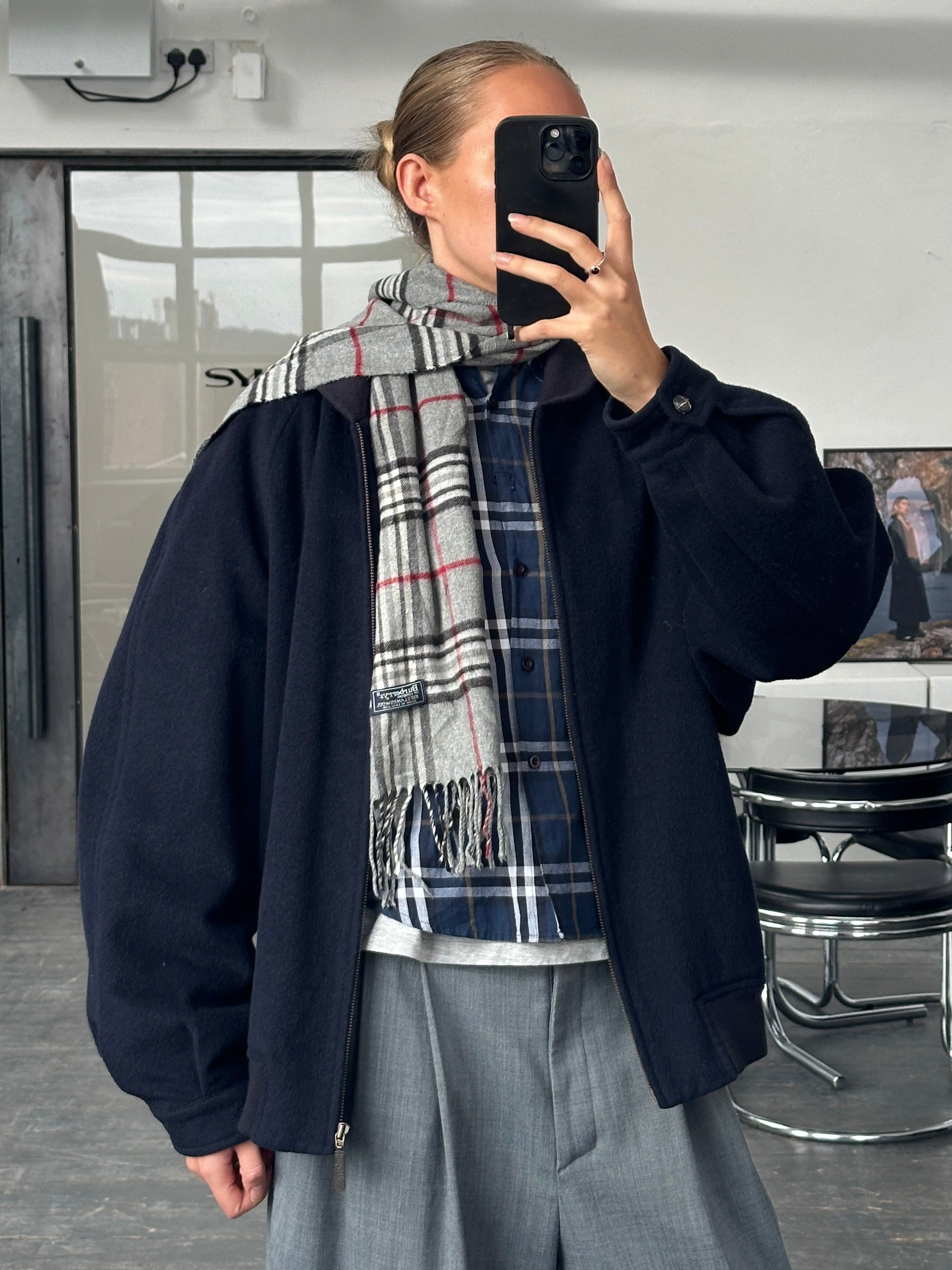 Burberry 1990s check logo pure wool bomber jacket in size L/XL with classic check pattern and ribbed collar and cuffs.