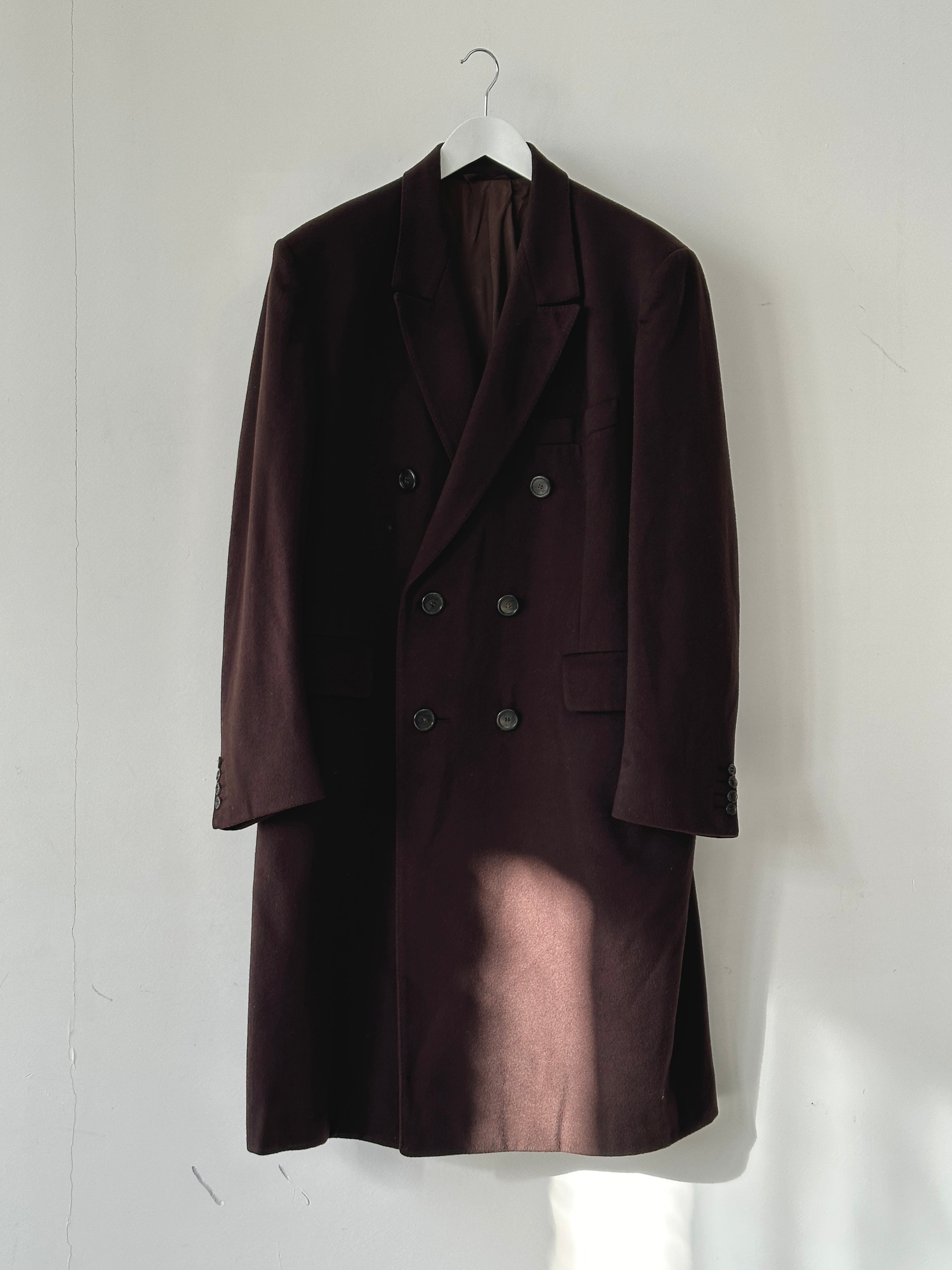 Christian Dior wool cashmere double-breasted coat in XL, shown on hanger with classic lapels and tailored fit.