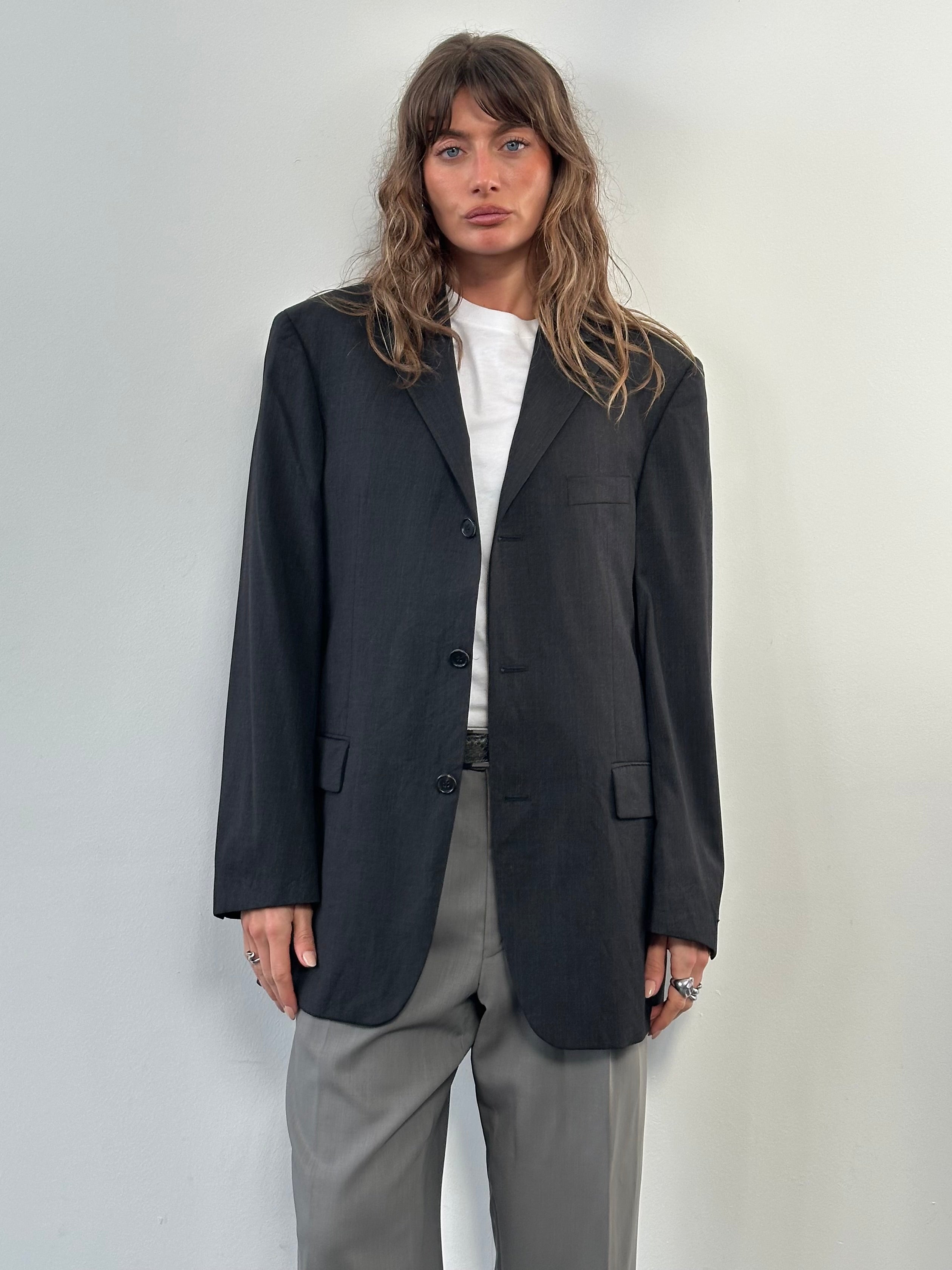 Hugo Boss x Loro Piana 2000s pure wool single-breasted blazer in size 40R/L, tailored fit with classic lapels and button closure.