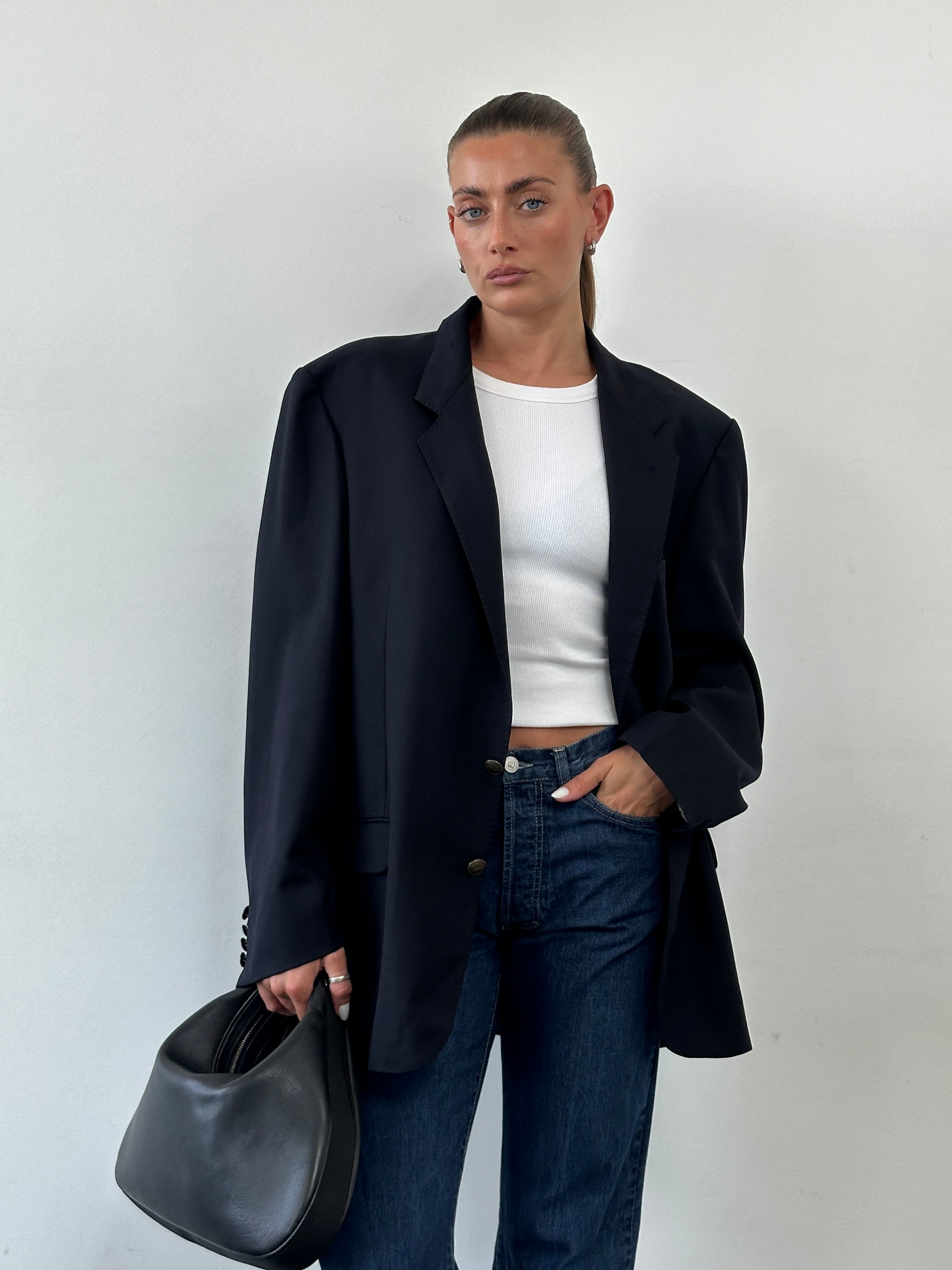 Yves Saint Laurent Pour Homme 1980s bespoke pure wool blazer in XL, tailored fit with classic button detail and structured lapels.