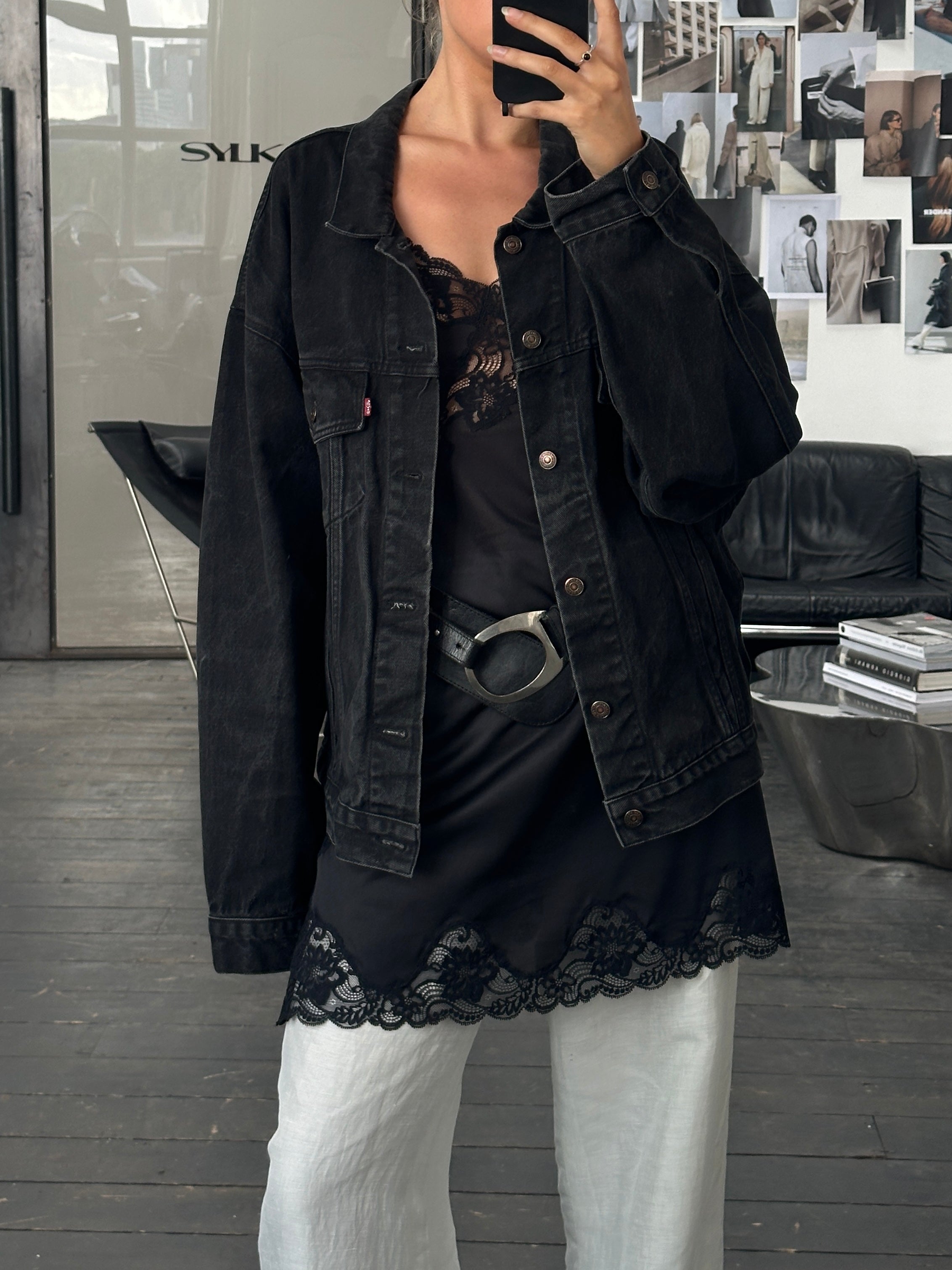 Levi’s 1990s washed denim jacket in XXL with classic design, button front, and faded blue denim fabric.