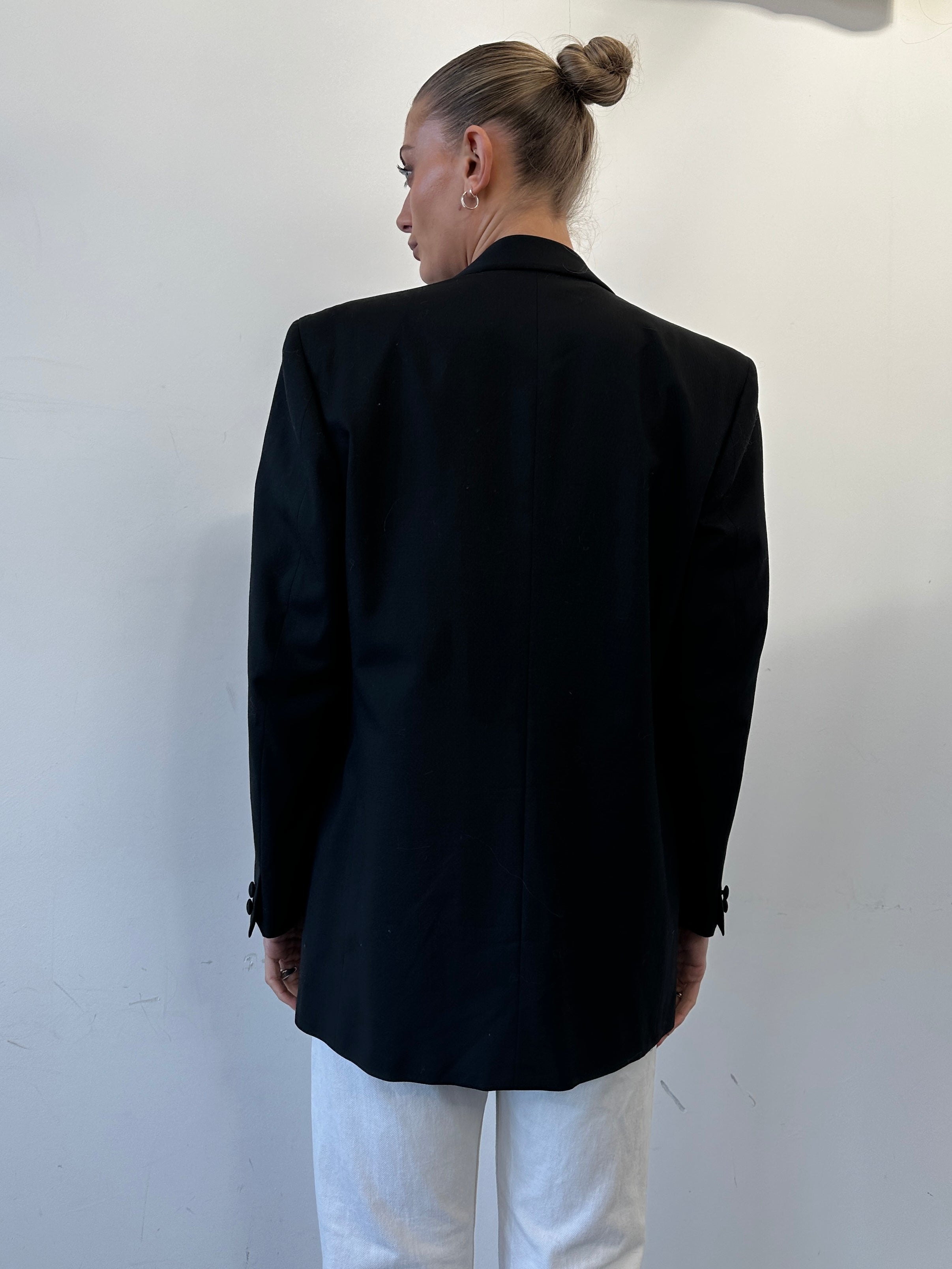 Cerruti pure wool single-breasted tuxedo blazer in classic black, tailored fit with notch lapels and sleek design.