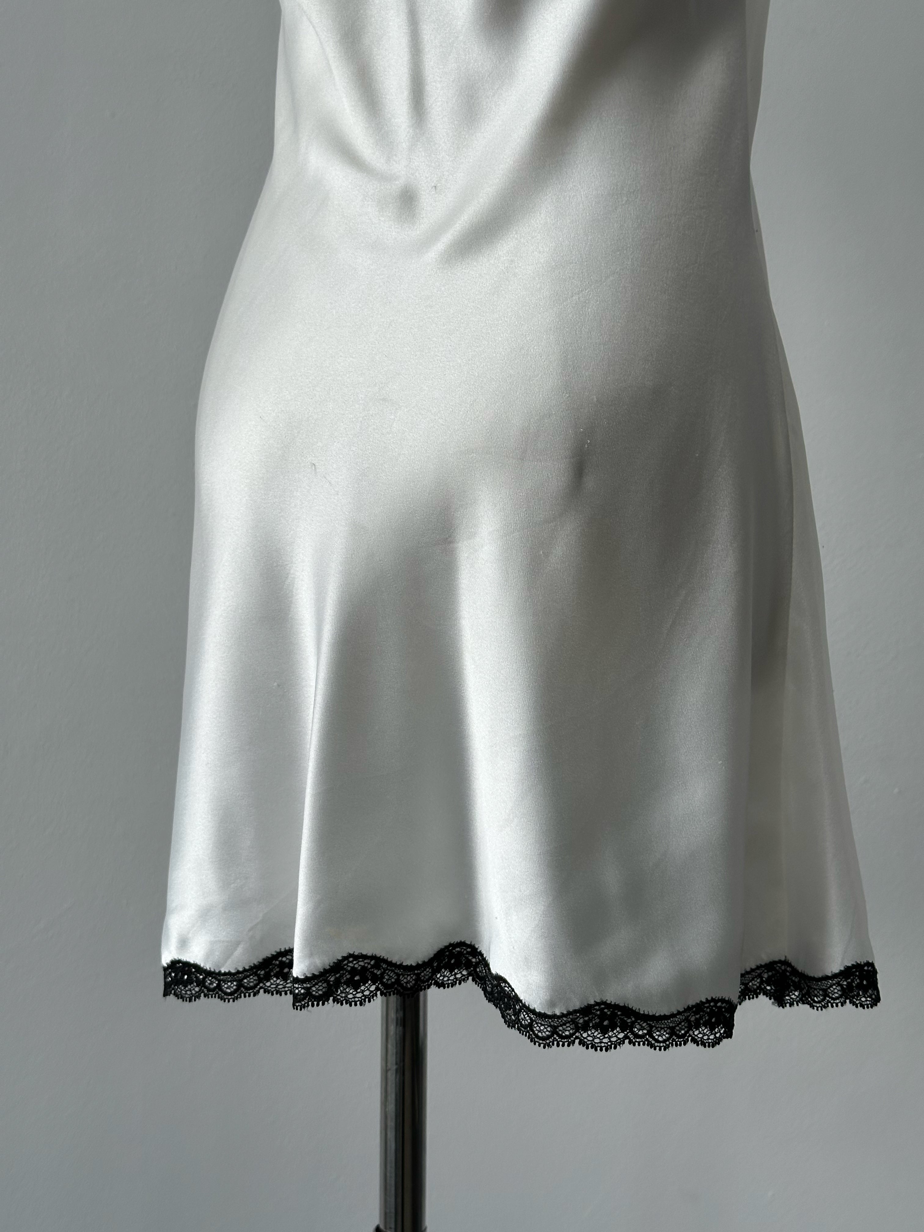 Victoria's Secret satin lace mini slip dress in XS/S with delicate lace details and a smooth satin finish.