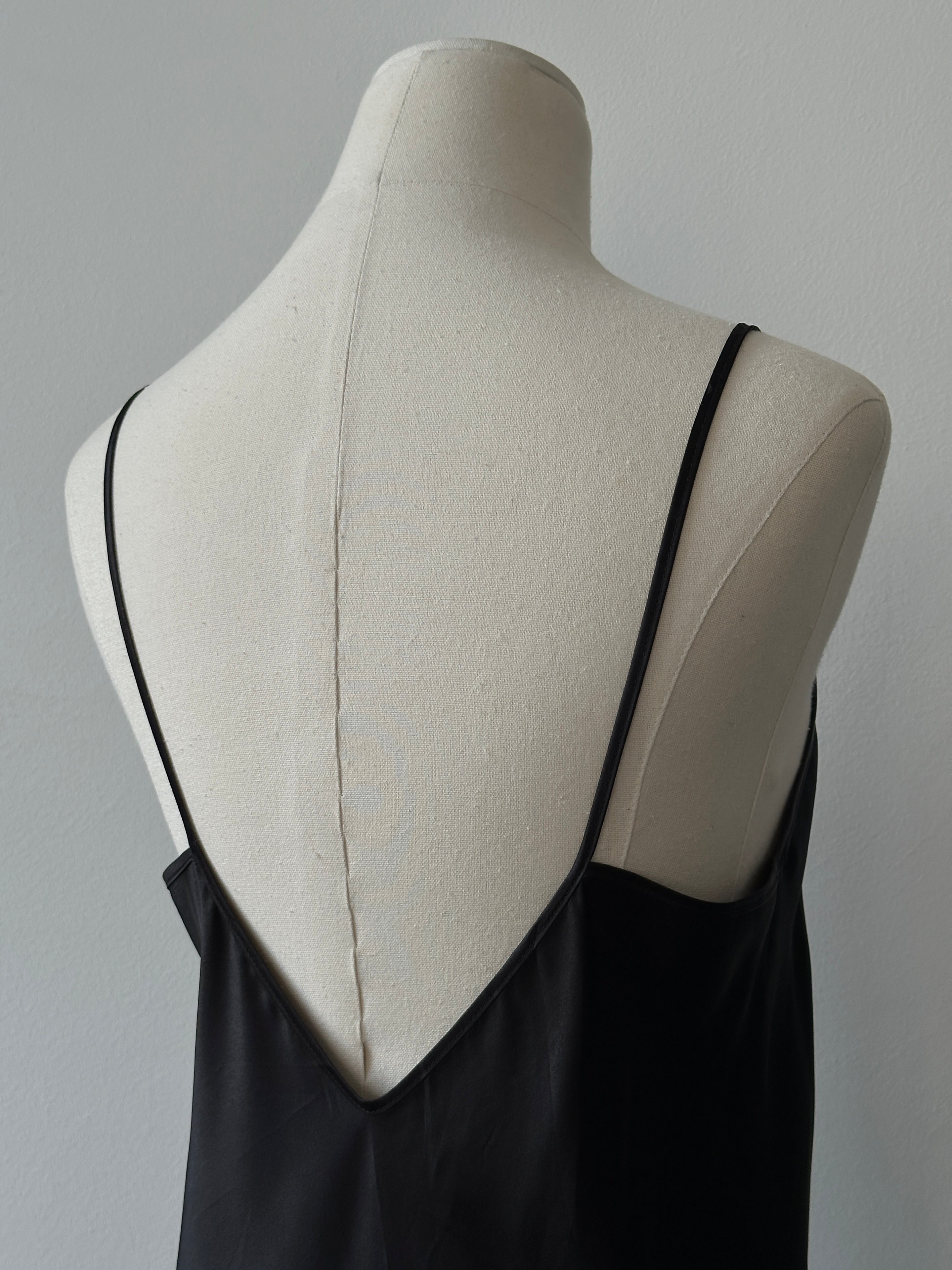 Vintage 1990s satin sleeveless dress in size M, with a sleek, classic design and smooth fabric, perfect for retro-inspired fashion.