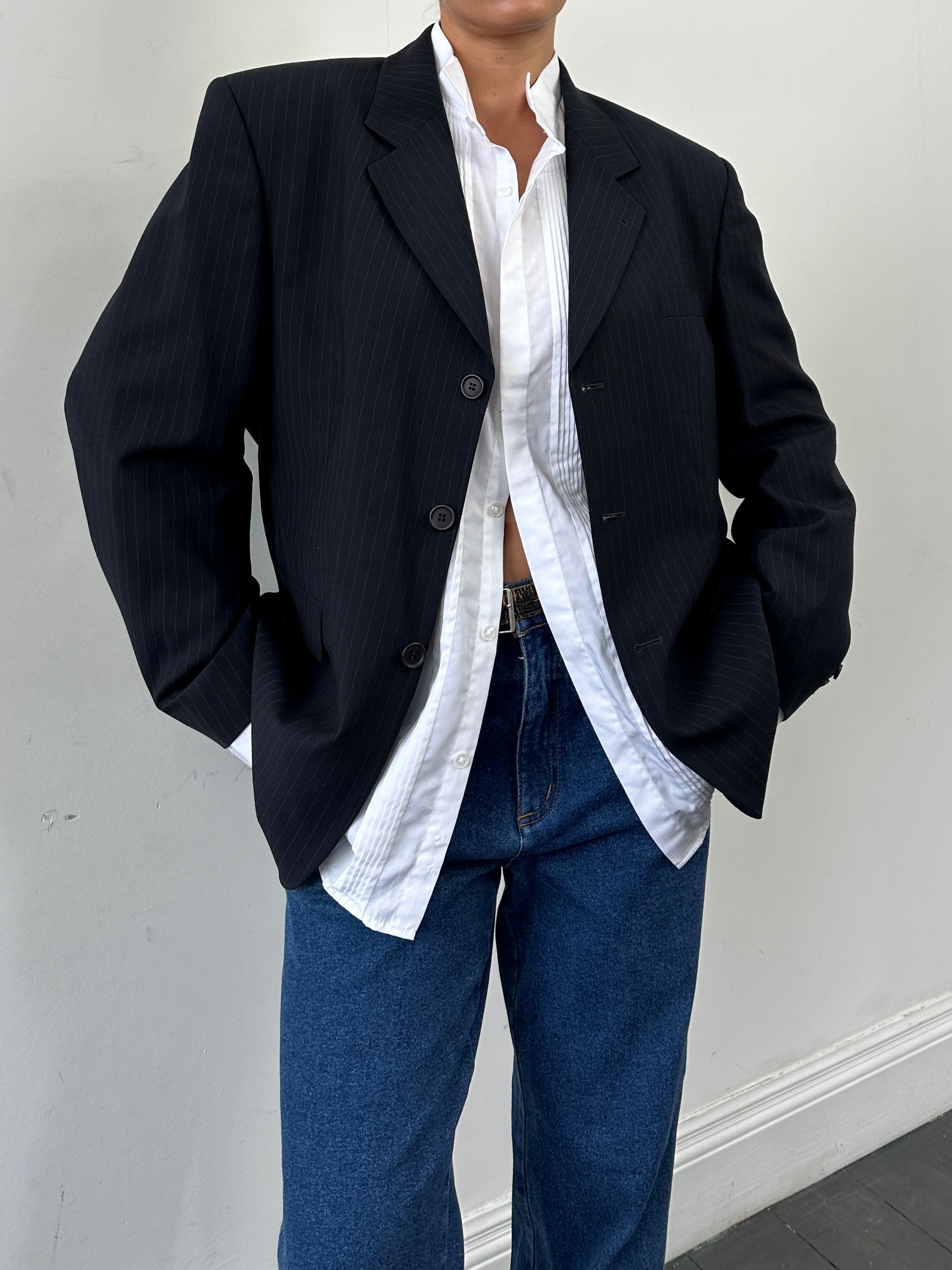 Vintage pinstripe wool blazer in size 44S/XL, single-breasted style with classic lapels and tailored fit.