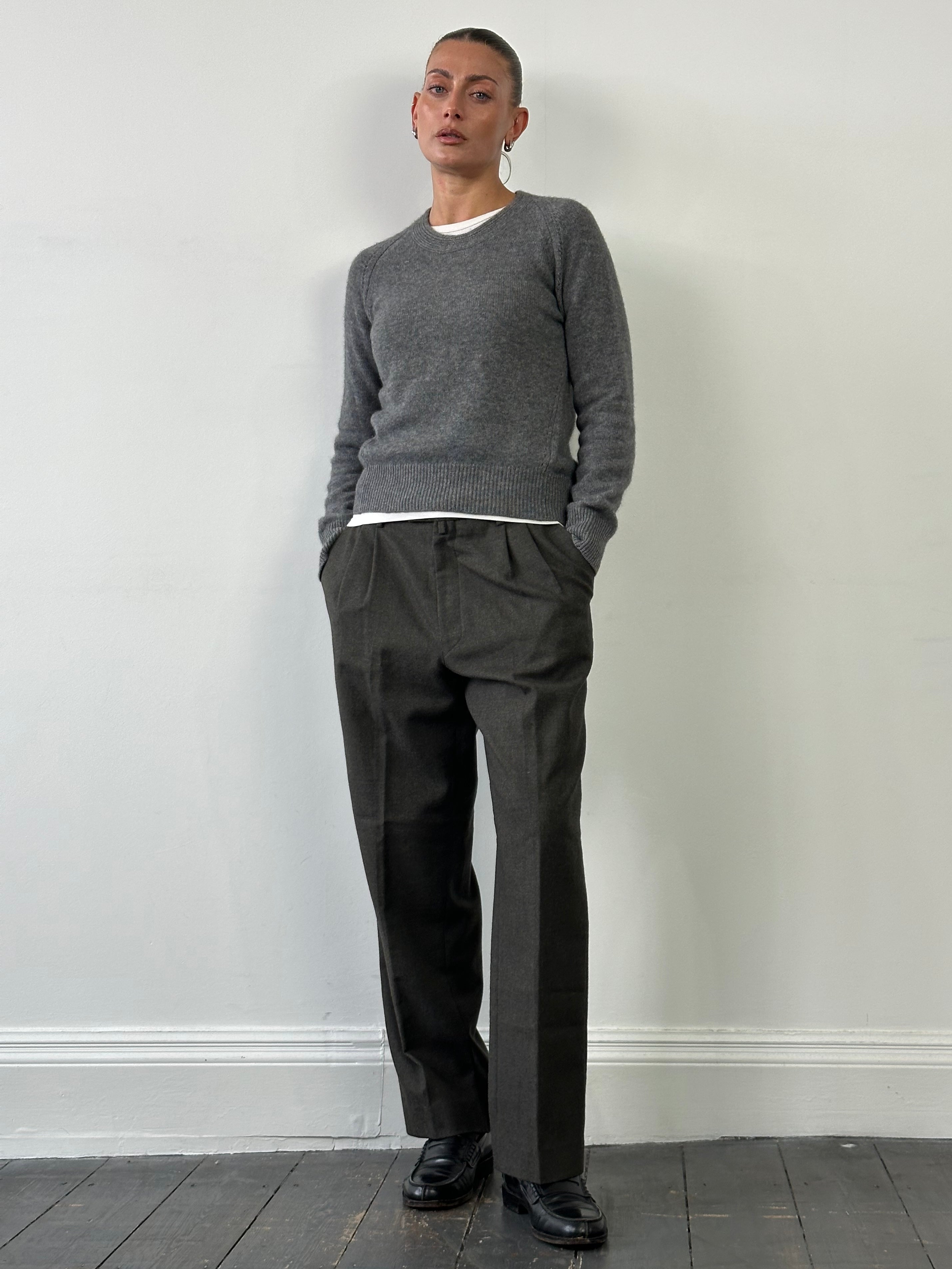 Vintage Italian vintage pure wool tailored trousers in size W32, featuring a classic fit and tailored design.
