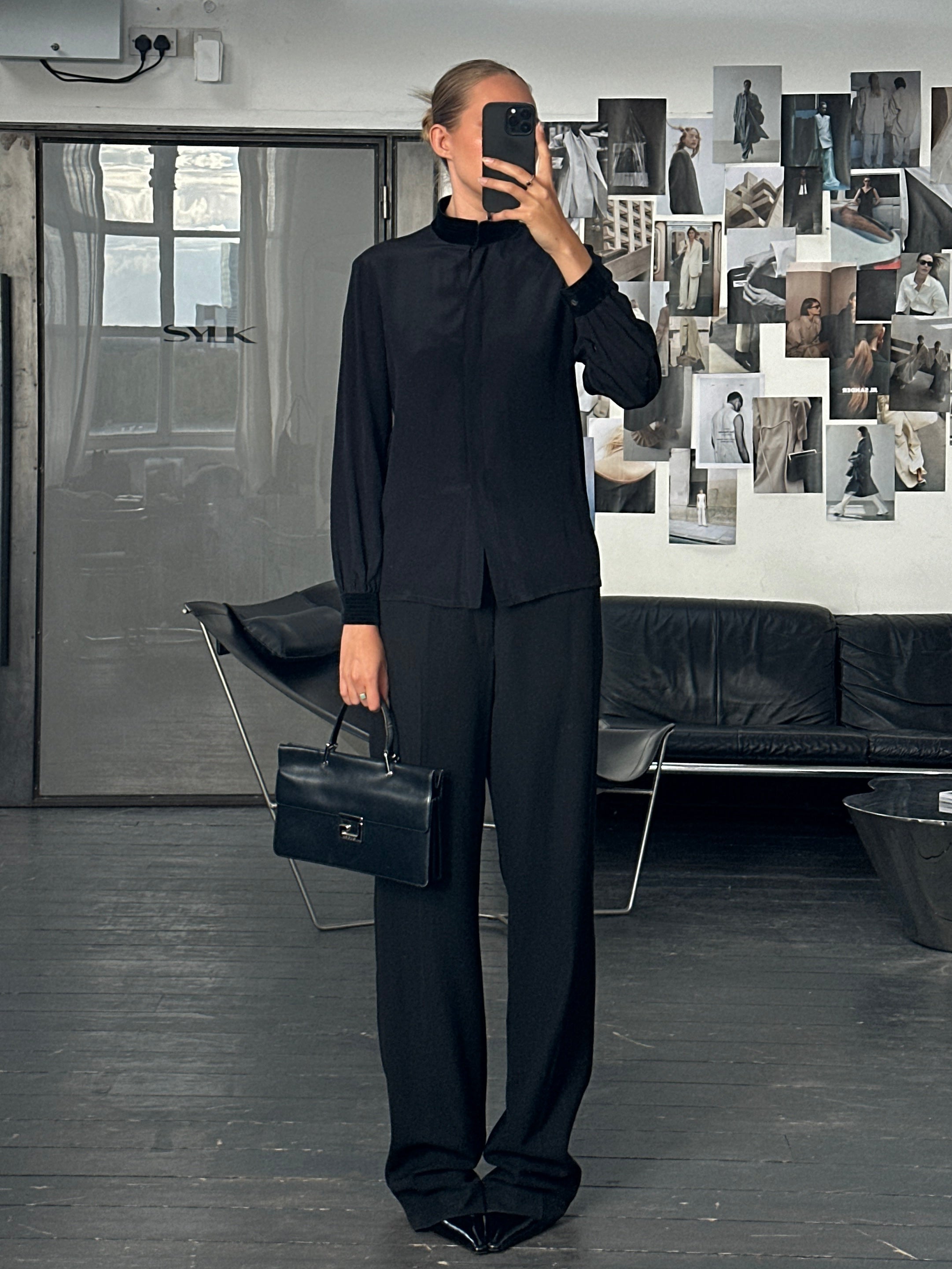 Vintage Italian 1980s pure silk shirt in XS/S, showcasing elegant collar and smooth fabric details.