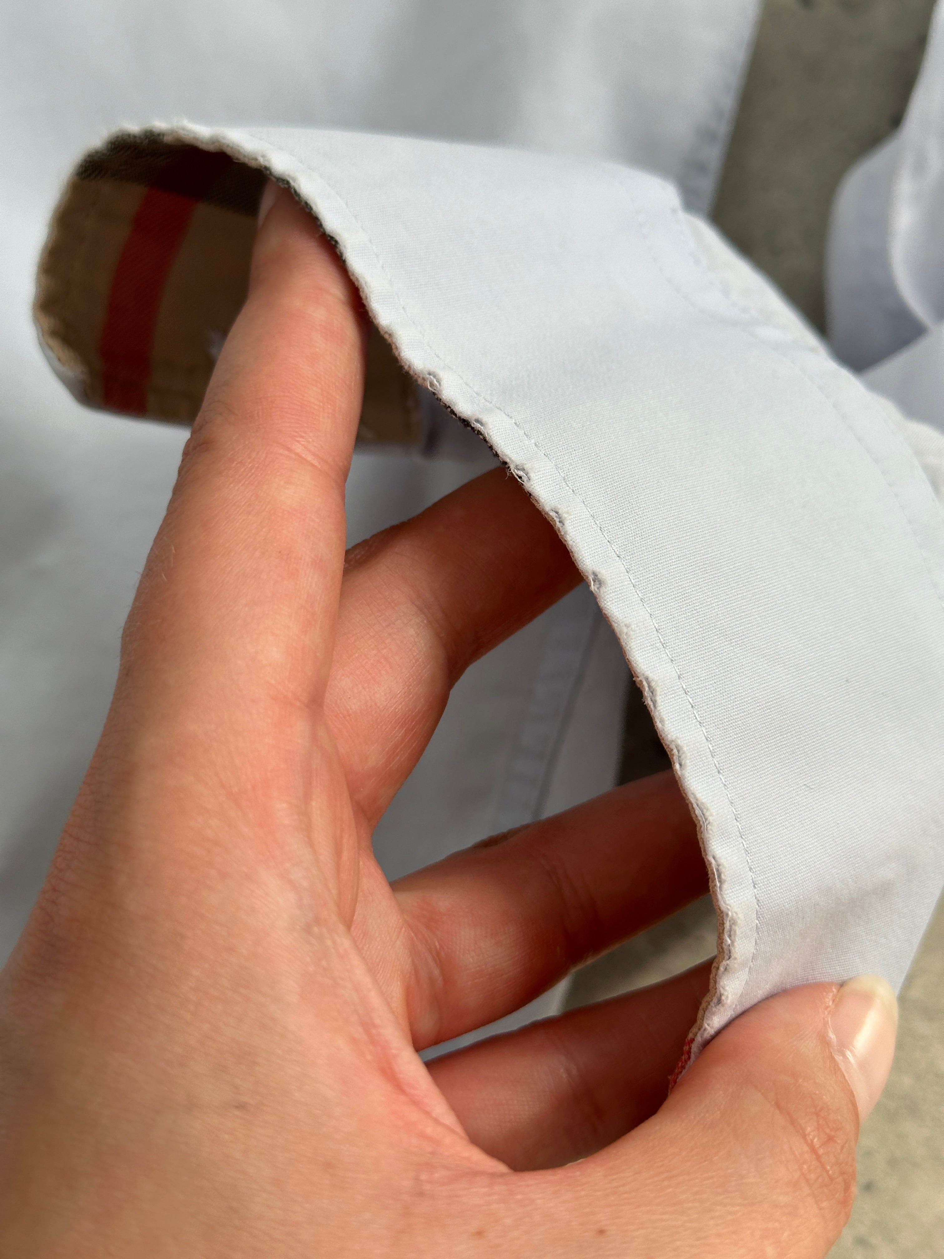 Burberry Brit cotton logo shirt in size M, featuring the classic brand logo and casual button-up style, displayed on a mannequin.