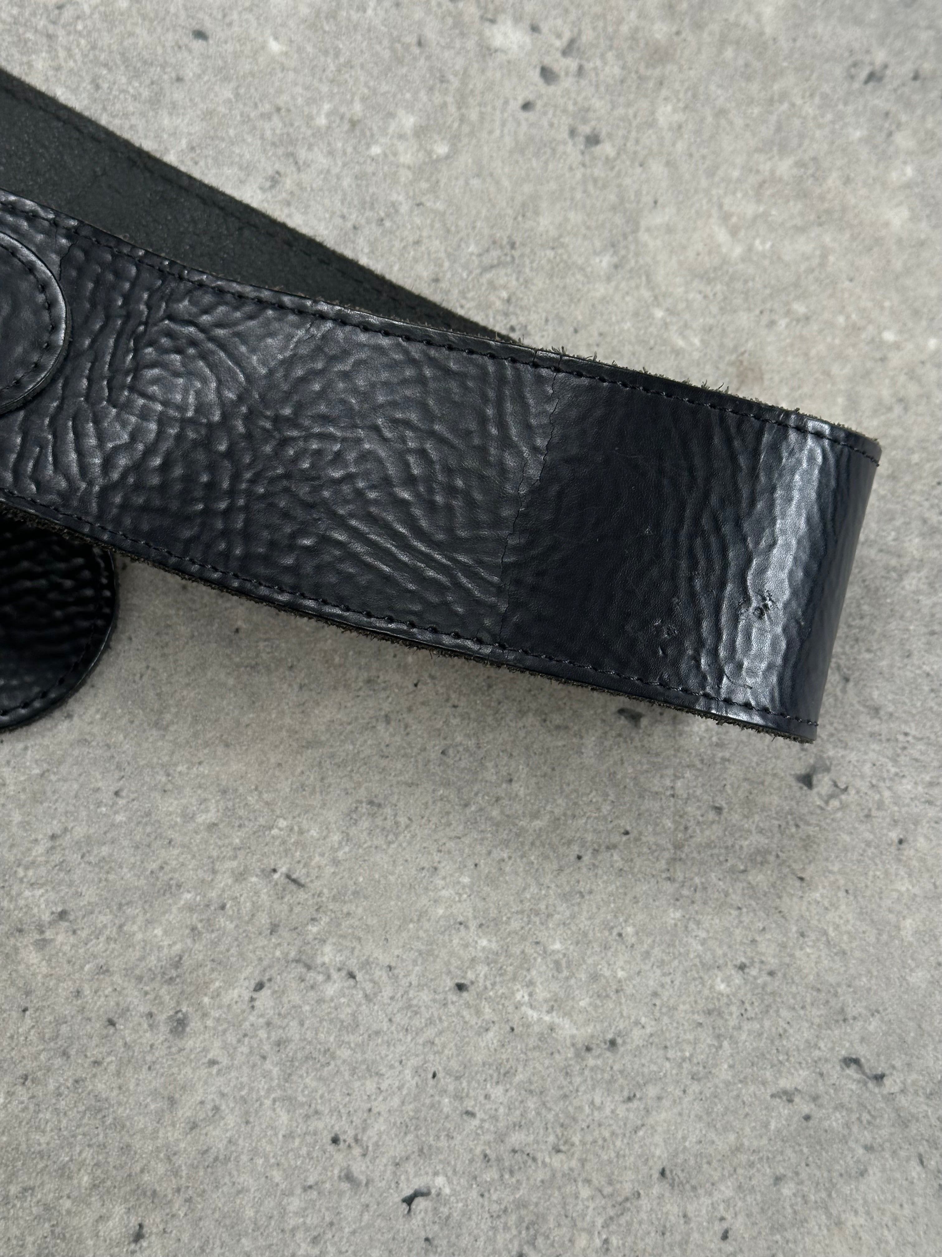 Vintage 1990s sculptural leather chunky belt with bold design, size W36-38, featuring textured vintage leather details.