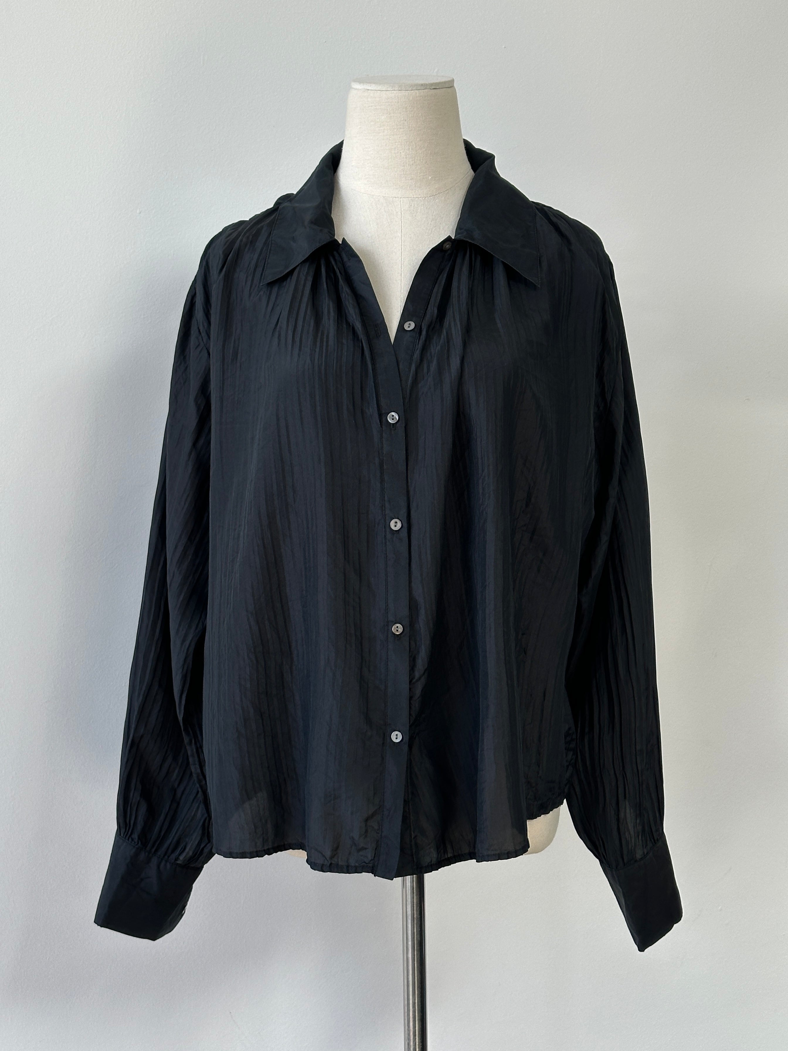 Vintage 1990s pure silk pleated shirt in size L, showcasing elegant fabric and classic design, ideal for retro fashion style.
