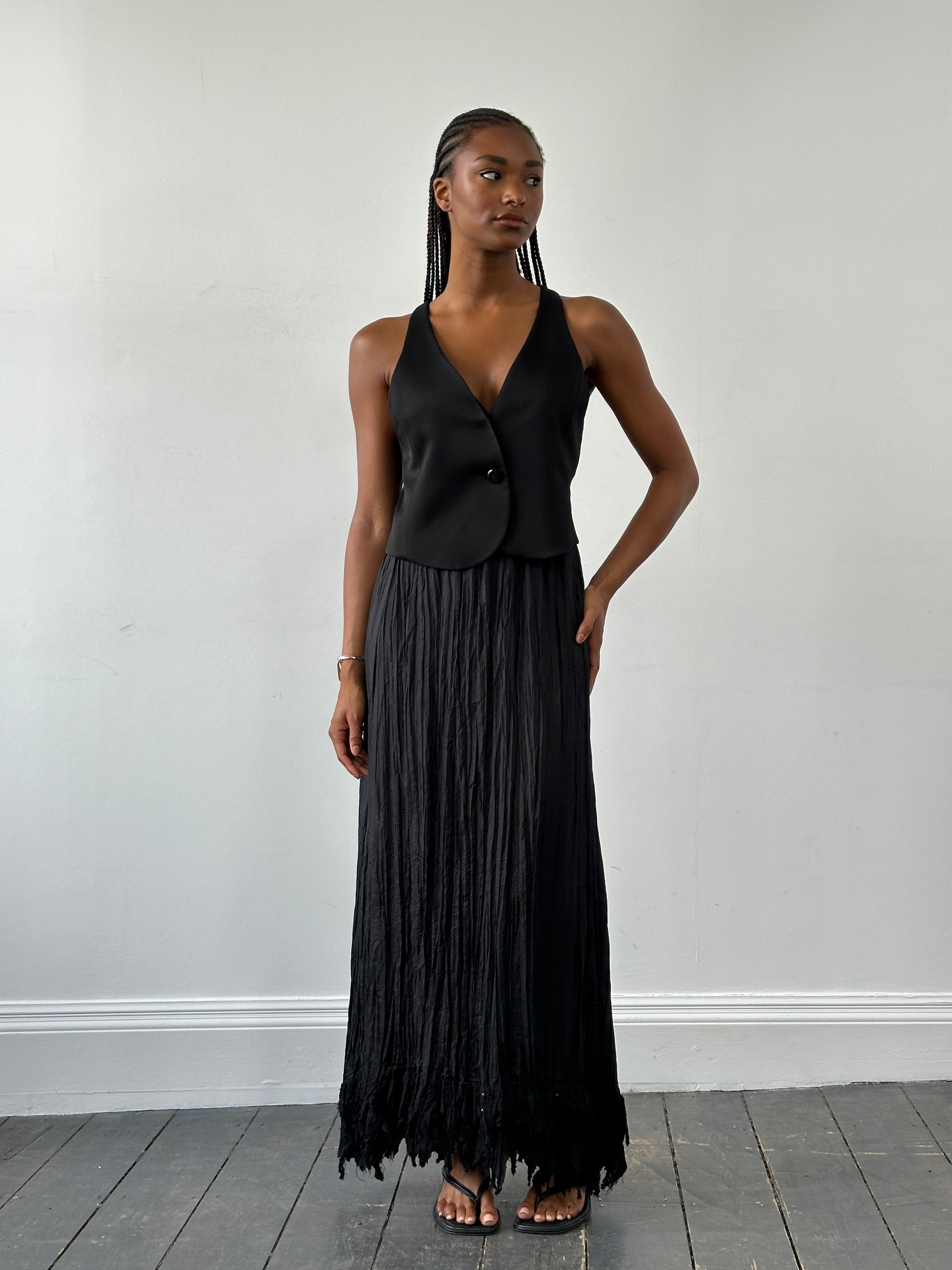 Vintage Italian 2000s pure silk crinkle midi skirt in S/M, featuring elegant flowy fabric and vintage style details.