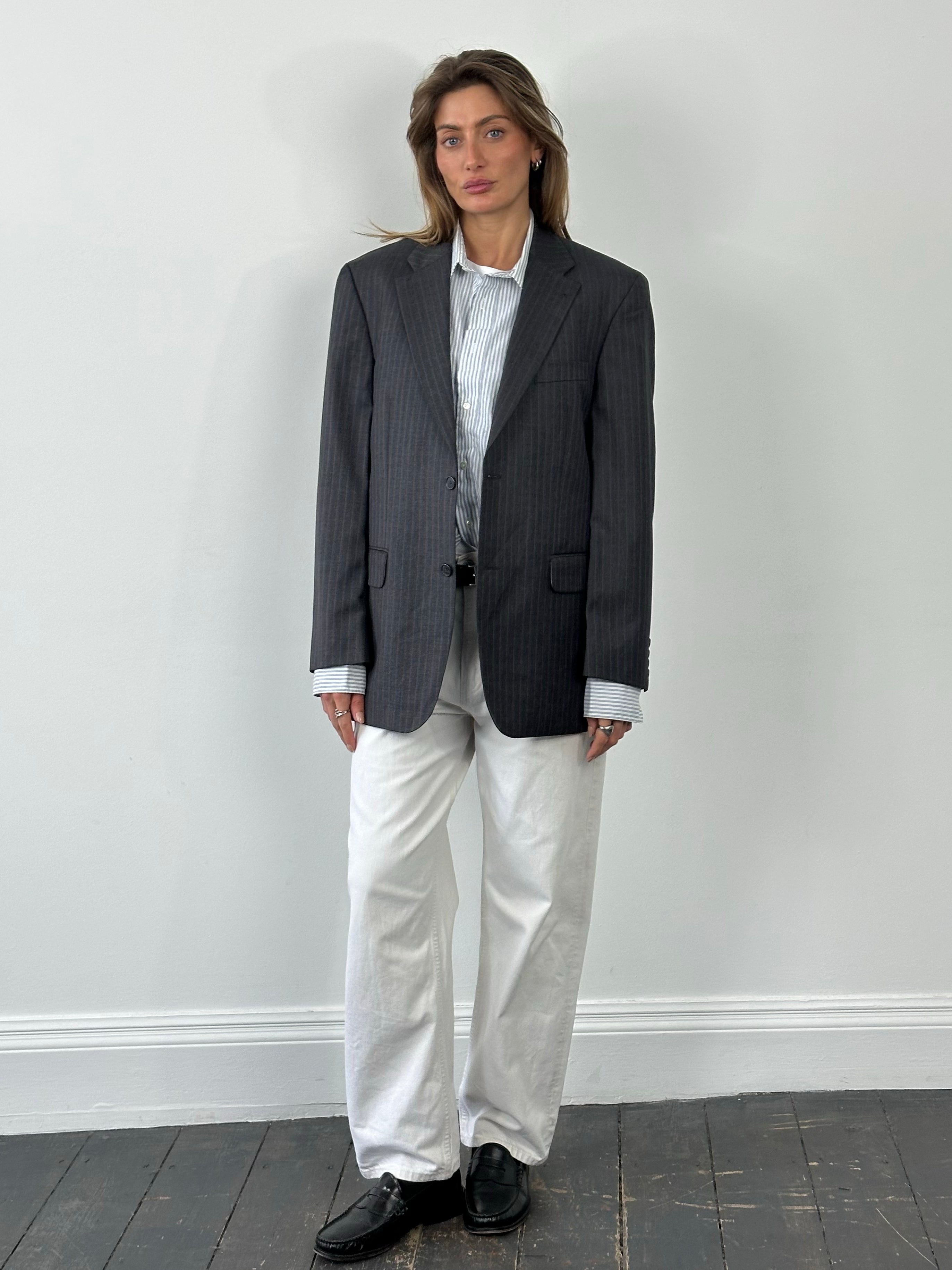 Loro Piana x Digel 1990s pure wool single-breasted blazer in size L, tailored fit, dark color, with classic lapel and button closure.