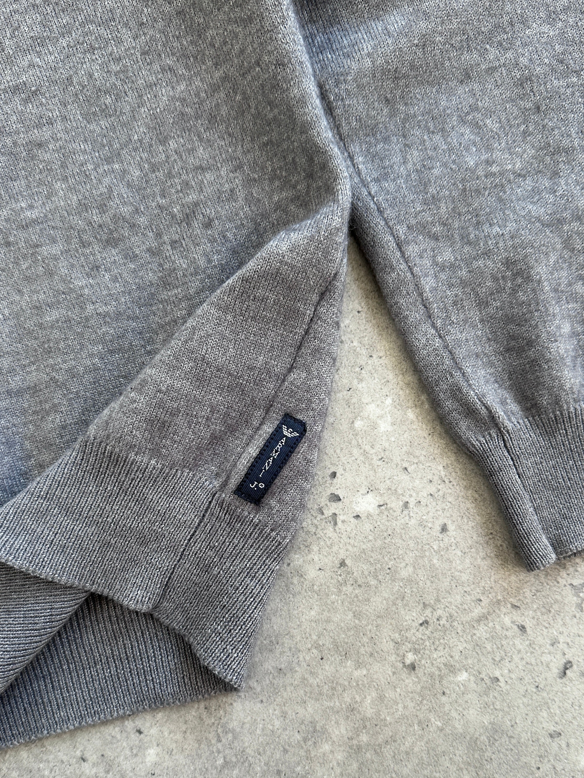 Armani Jeans 1990s wool knitted jumper with button neck in black, featuring a classic fit and textured knit design.
