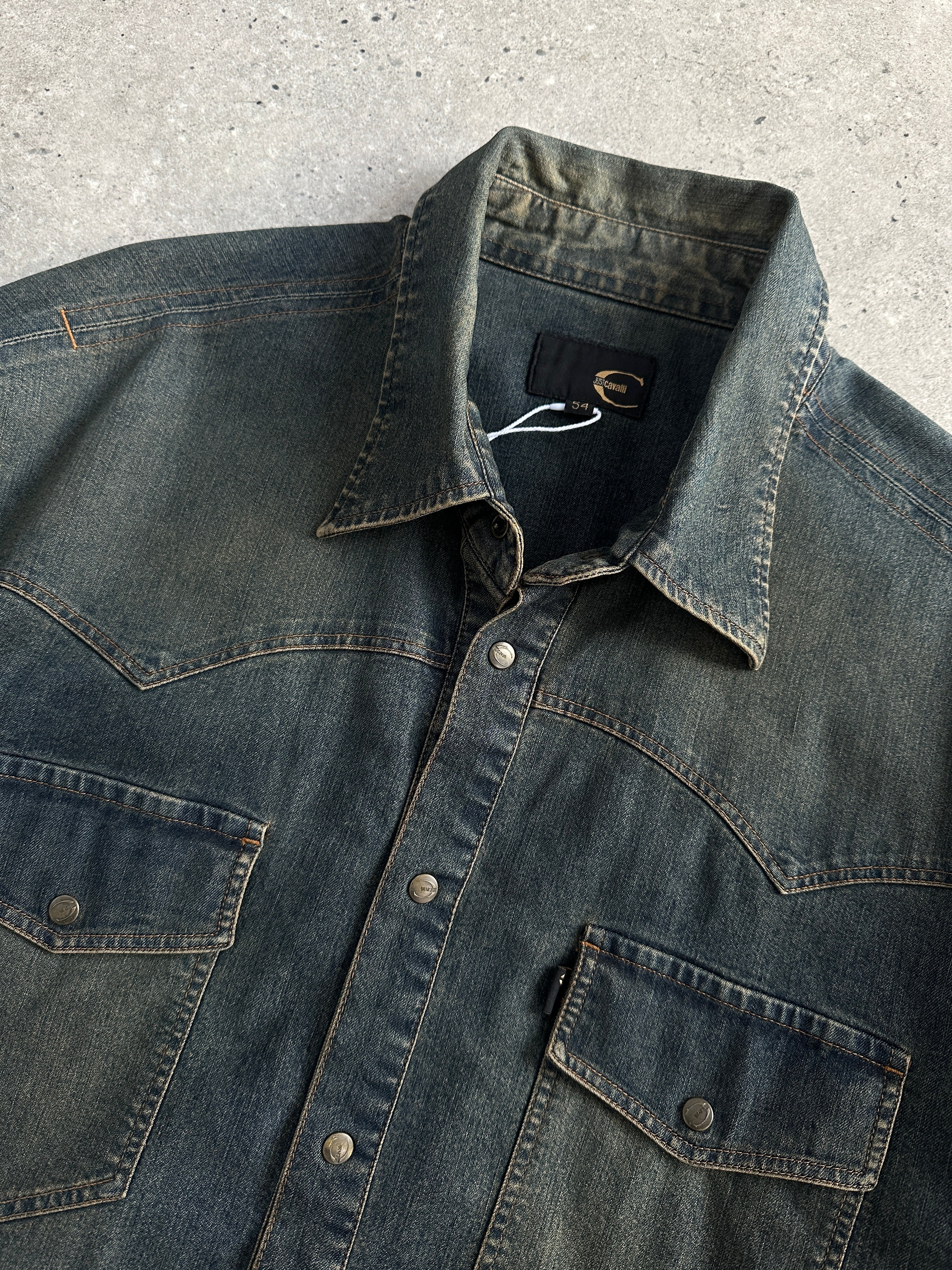 Roberto Cavalli Just Cavalli faded denim shirt in size large, featuring distressed details and classic button-up style.