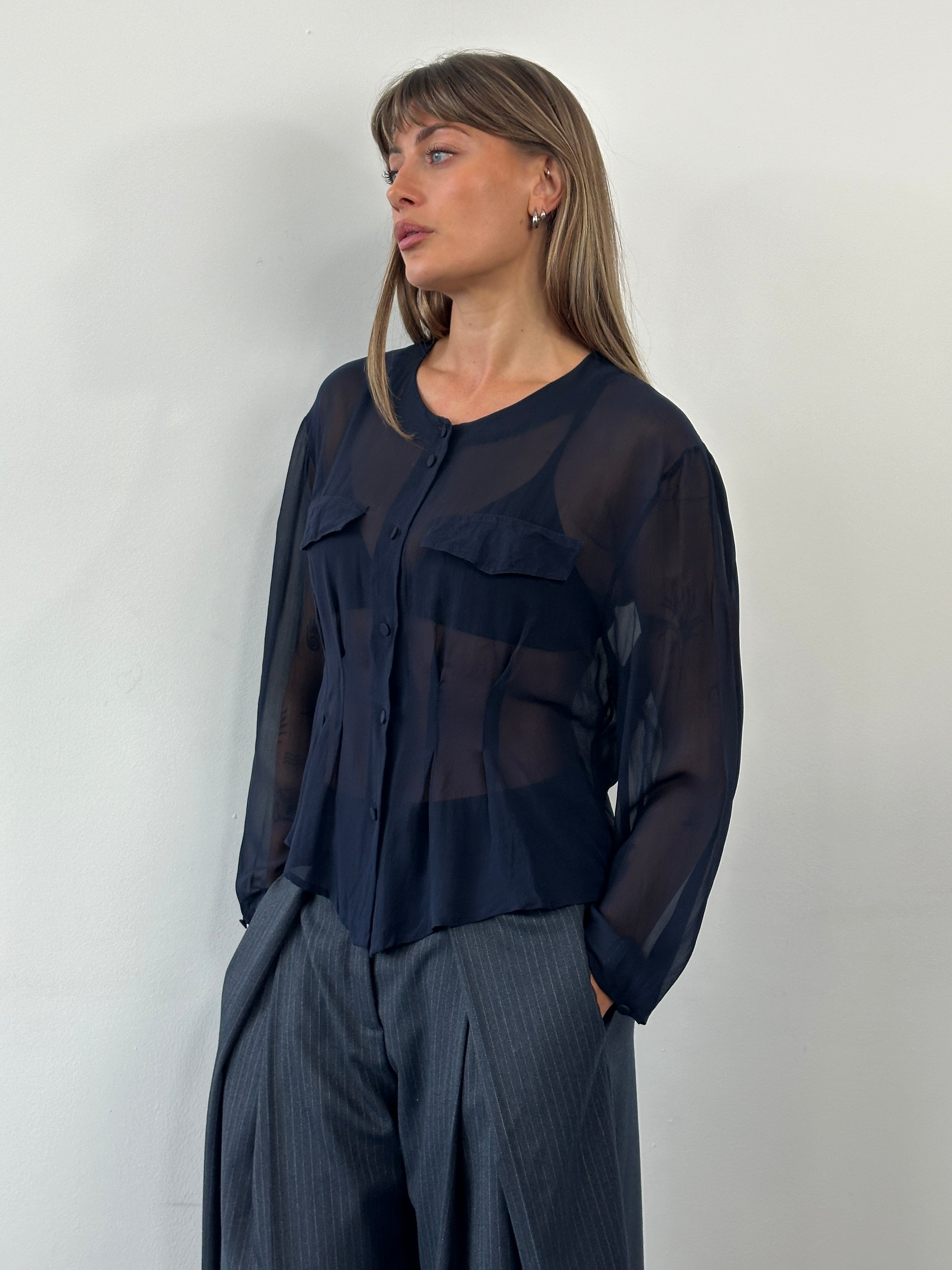 Vintage 1990s pure silk sheer shirt in size M, featuring lightweight, translucent fabric and classic design.