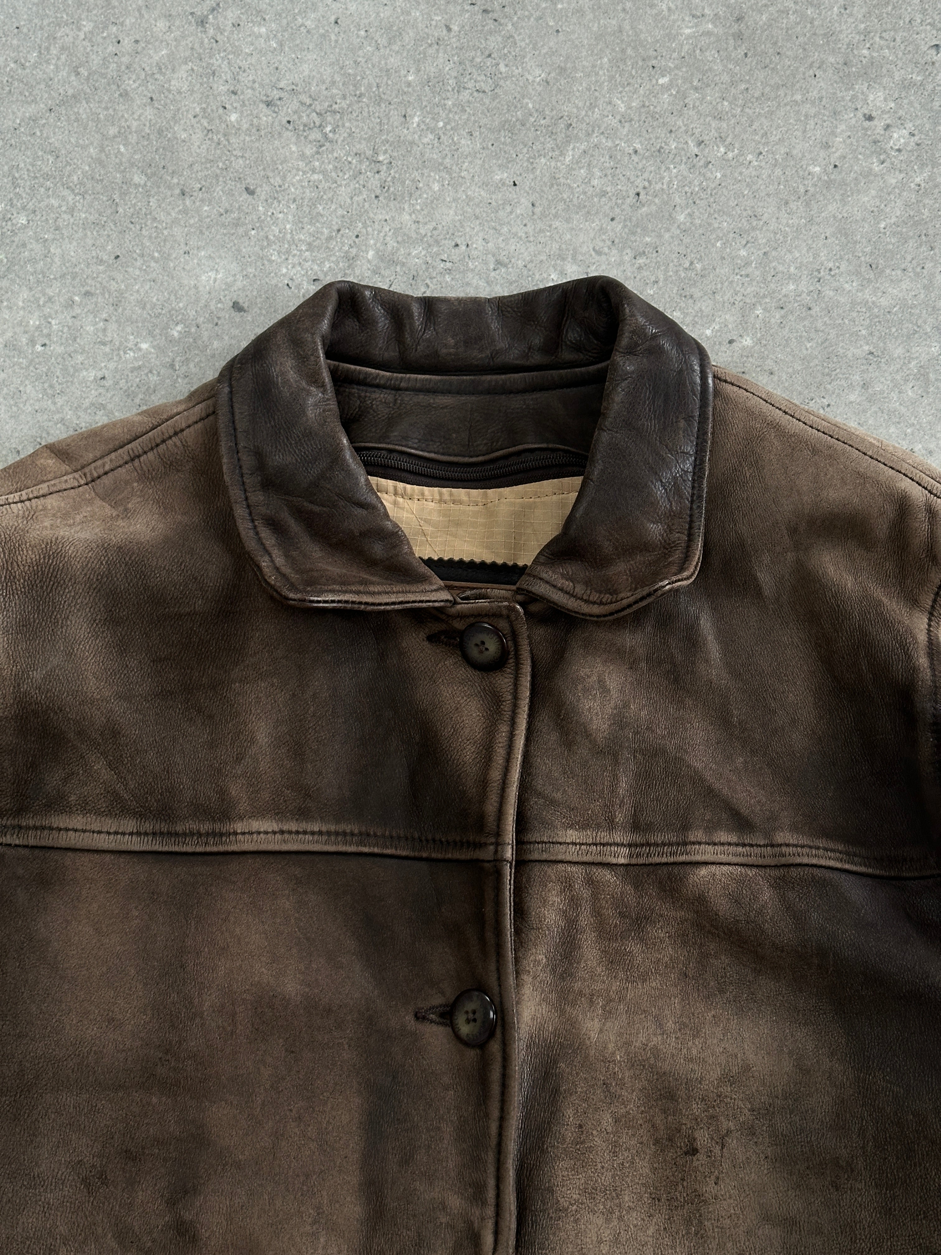 Vintage 1990s distressed leather jacket, men's size M, with worn leather and classic style.