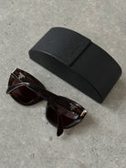 Prada Tortoise Shell Round Logo Sunglasses - SYLK