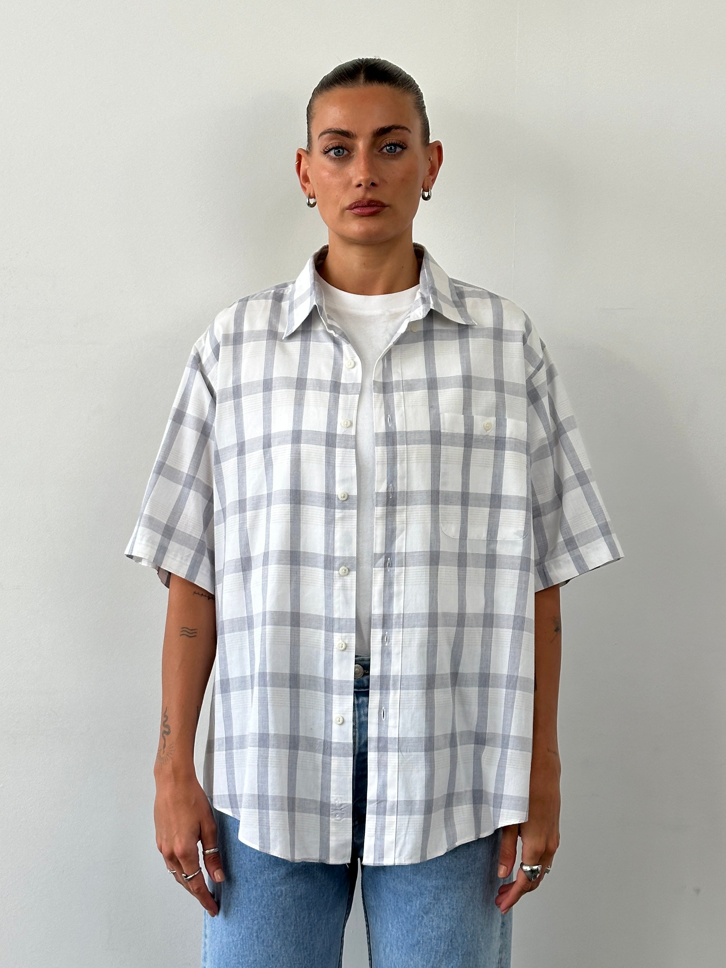Christian Dior 1990s check cotton shirt in XL, featuring a classic plaid pattern and button-down front.
