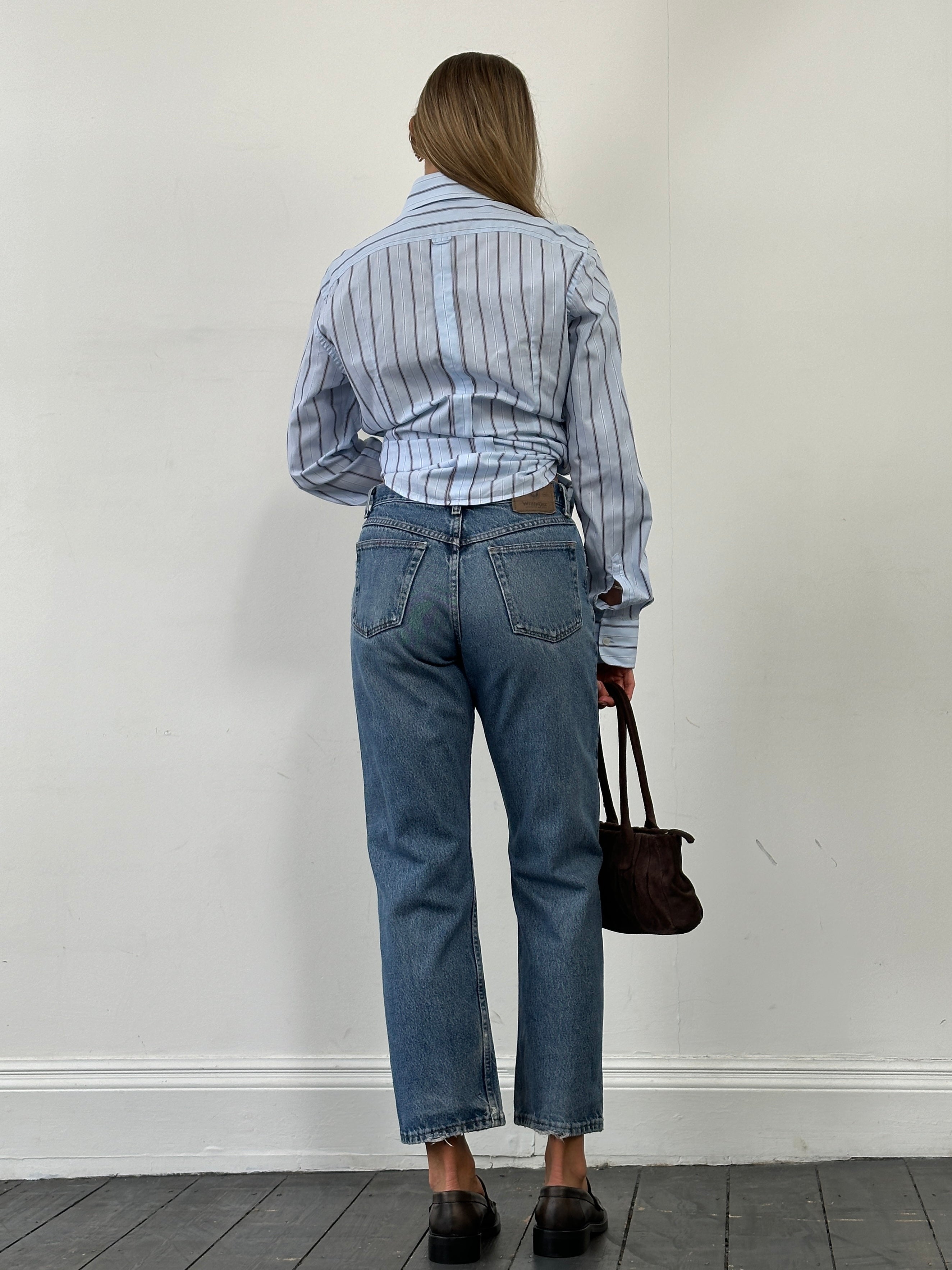 Wrangler mid wash straight leg high waisted denim jeans, front view showing classic fit and high waist, size W28.