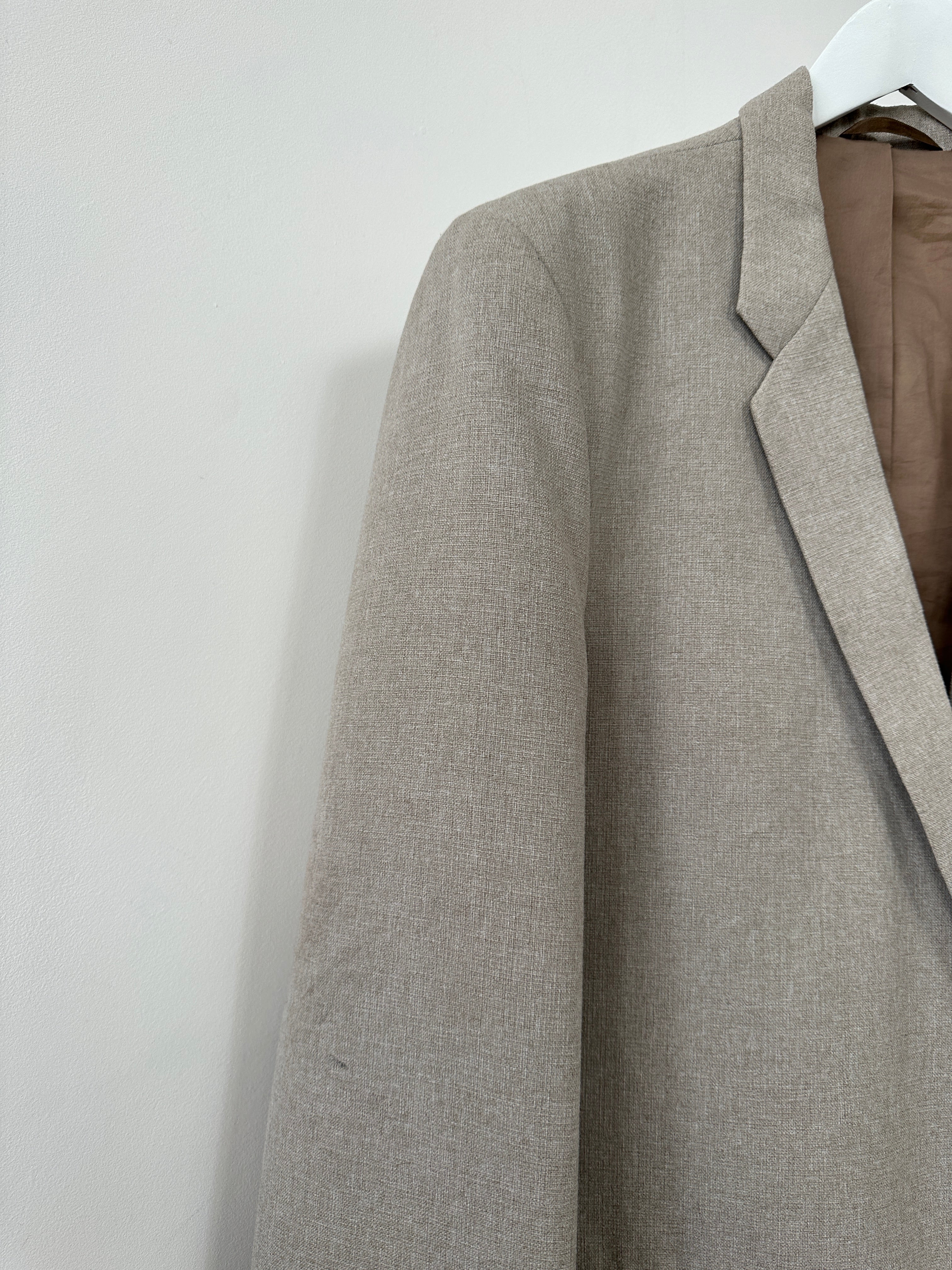 Vintage British vintage minimal blazer in size L, tailored fit with classic lapels and sleek design, perfect for smart casual wear.