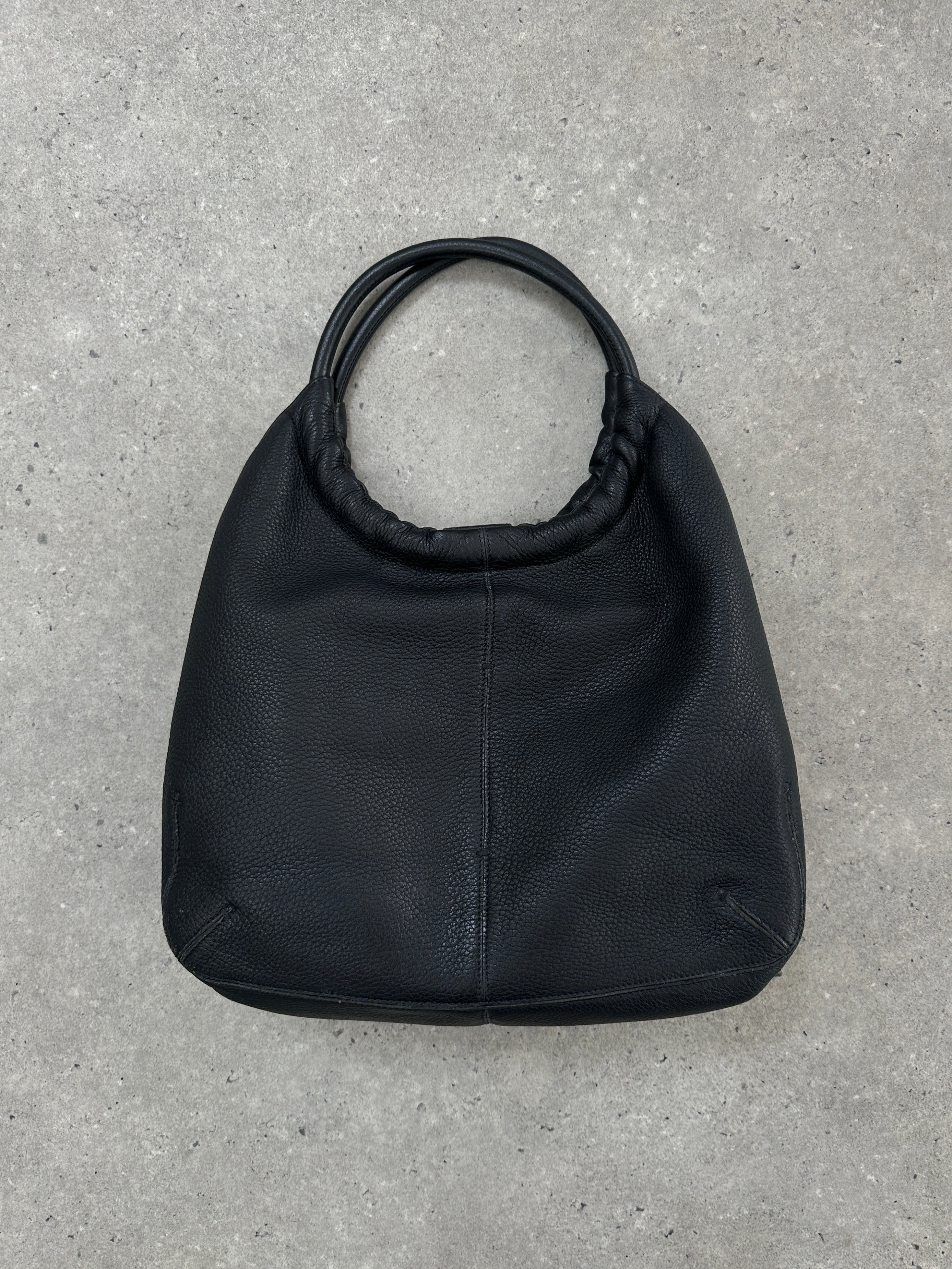 Giorgio Armani 2000s leather hobo shoulder bag in classic design with soft leather and spacious interior.