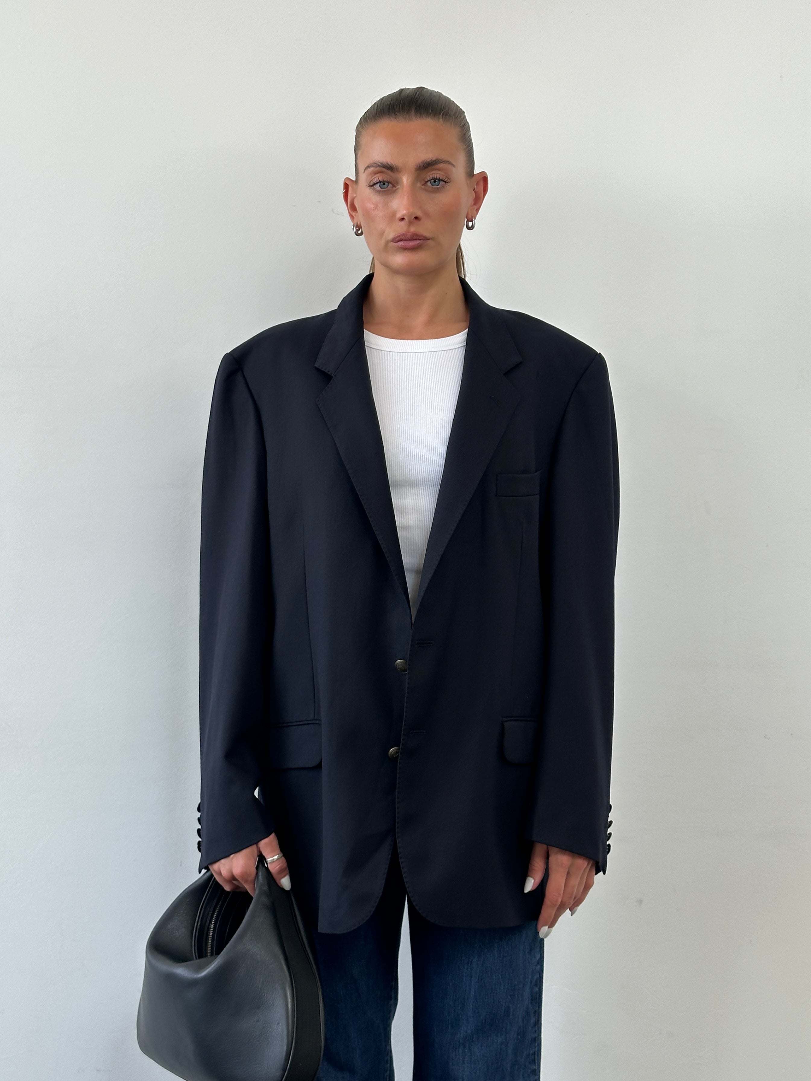 Yves Saint Laurent Pour Homme 1980s pure wool bespoke button blazer in XL, tailored fit with classic lapel and front buttons.