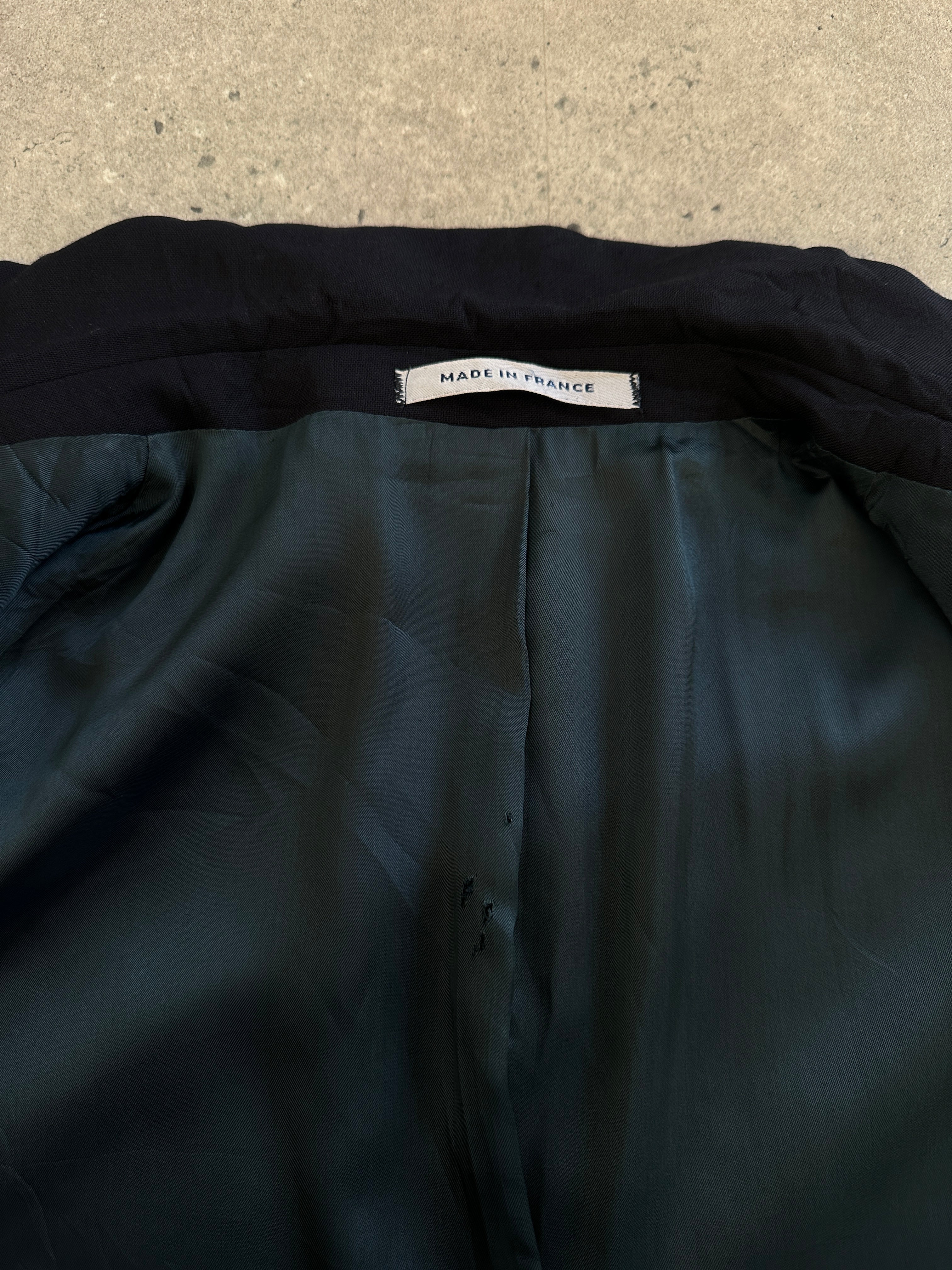 Yves Saint Laurent menswear 1990s pure wool single-breasted blazer in size 44R/XL, tailored fit with classic lapel and button closure.