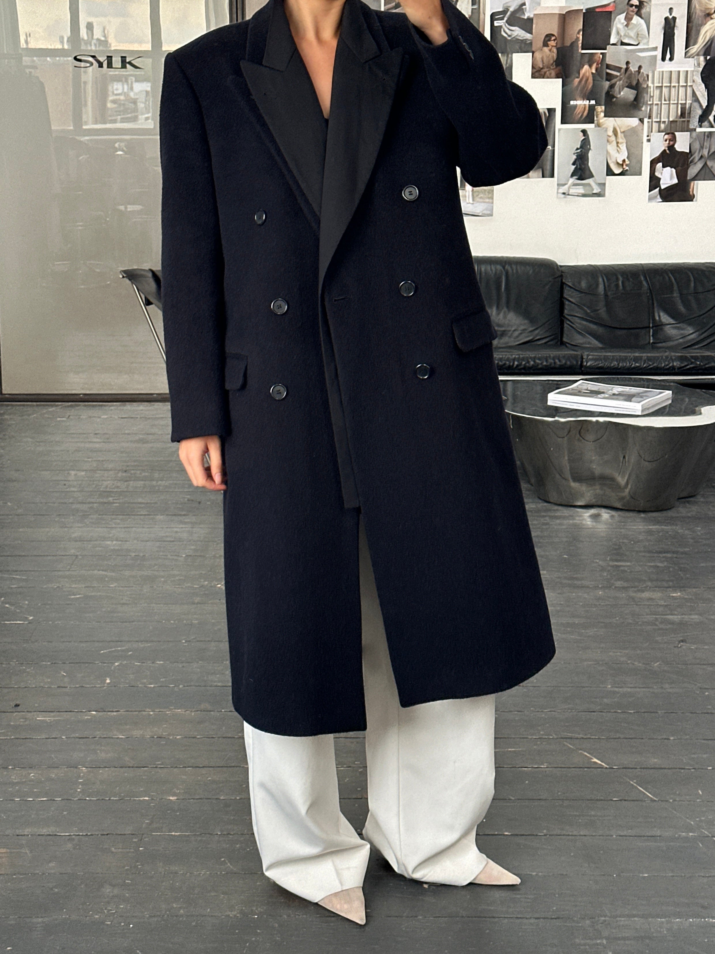 Vintage British 1990s wool cashmere double-breasted coat in XL, classic style with tailored fit and textured fabric.