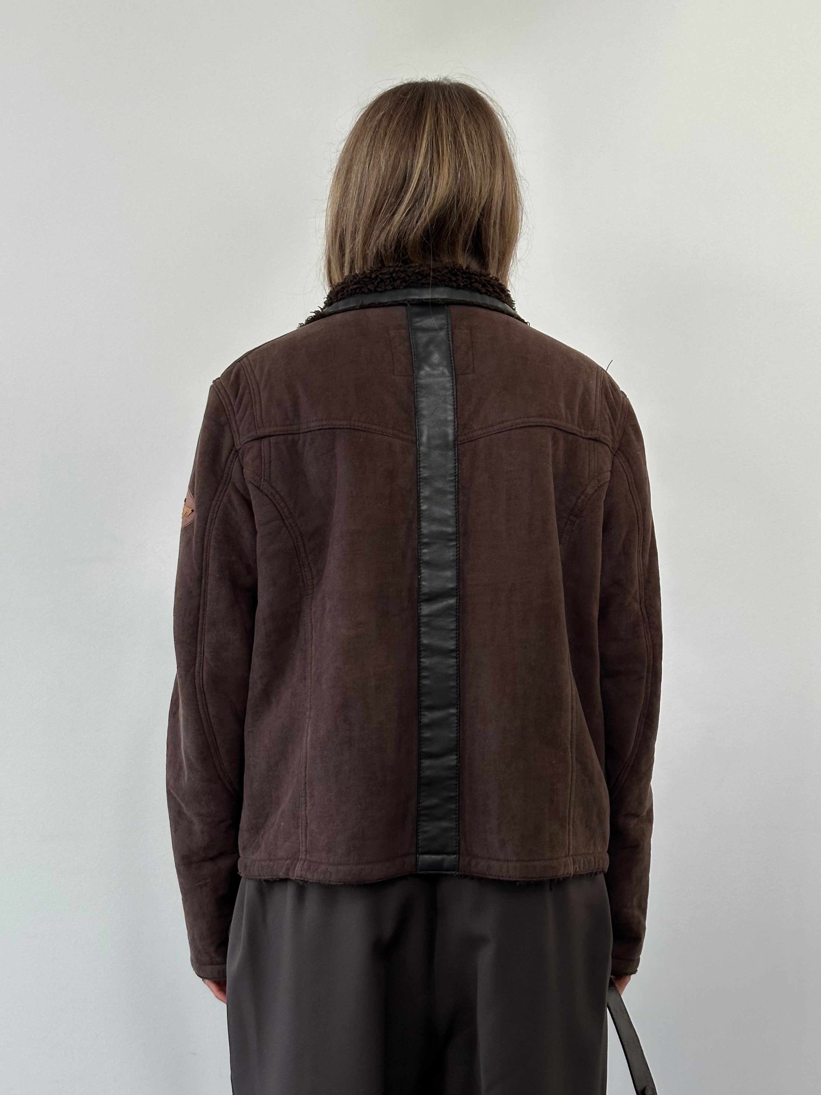 Armani Jeans double zip faux suede jacket in M/L displayed on a hanger, featuring a stylish design with multiple zippers.