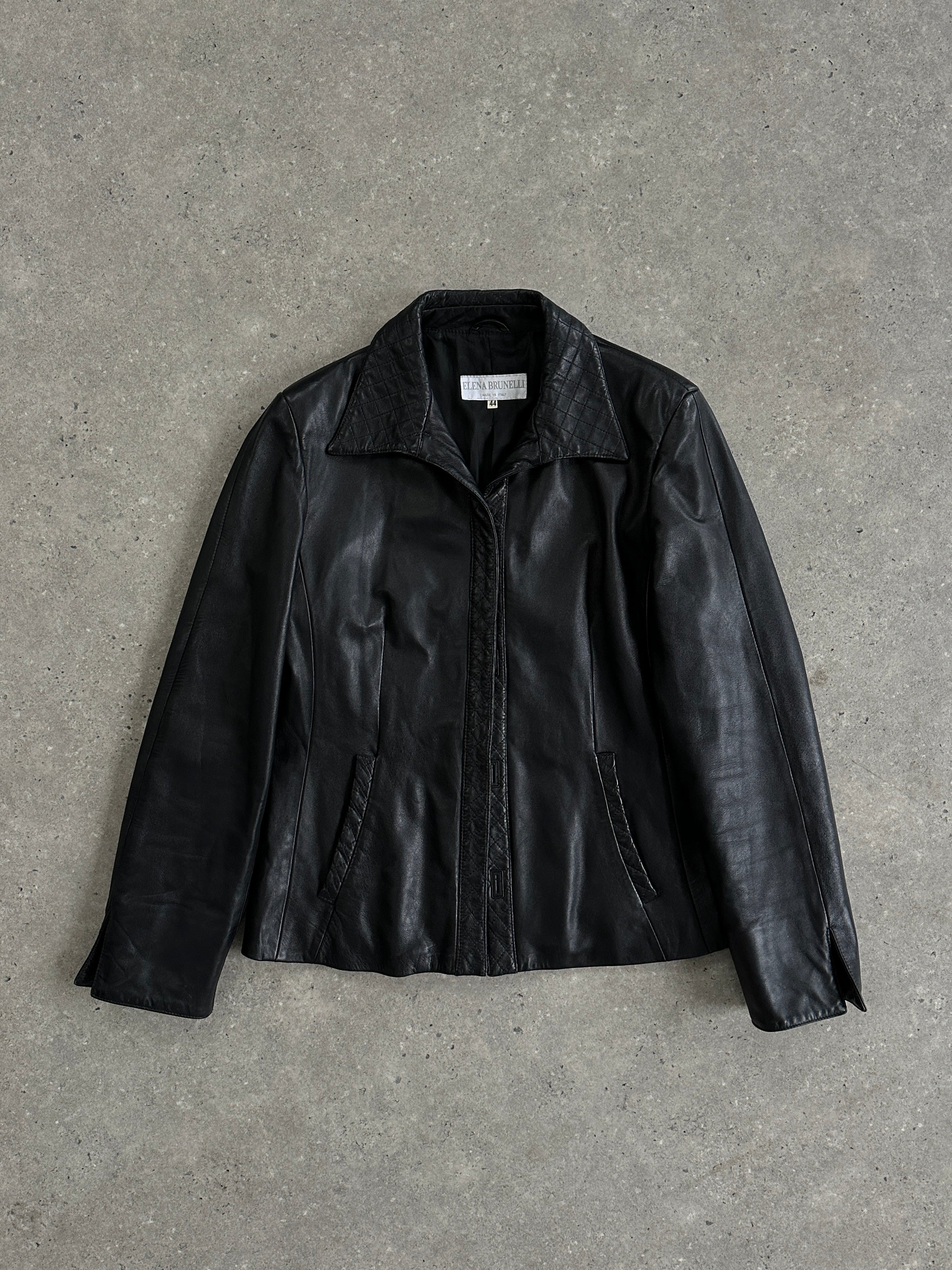 Vintage Italian leather jacket in size S featuring classic vintage design and rich brown leather texture.