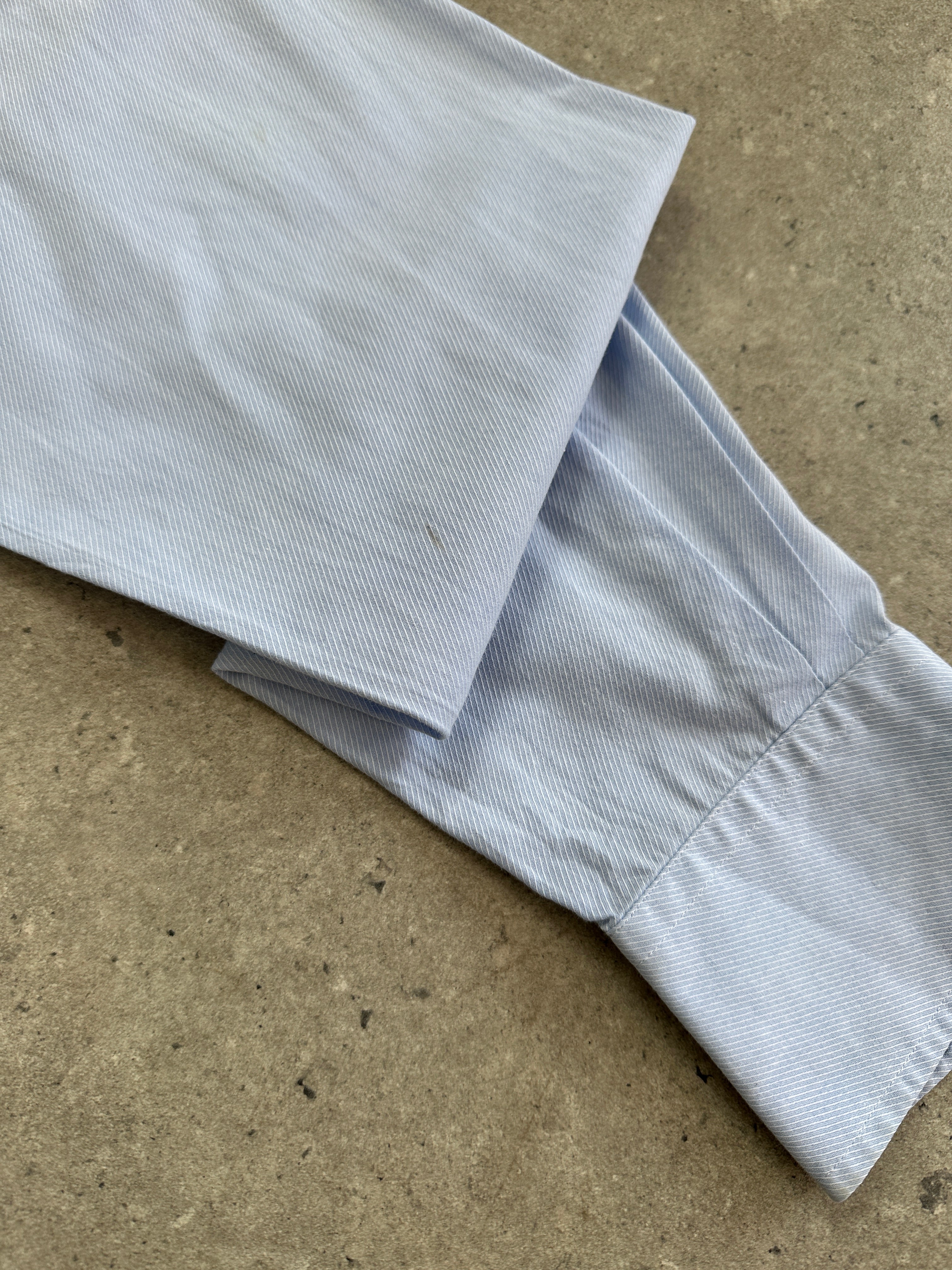 Yves Saint Laurent Pour Homme cotton logo shirt in size M, featuring classic design and brand logo on the front.