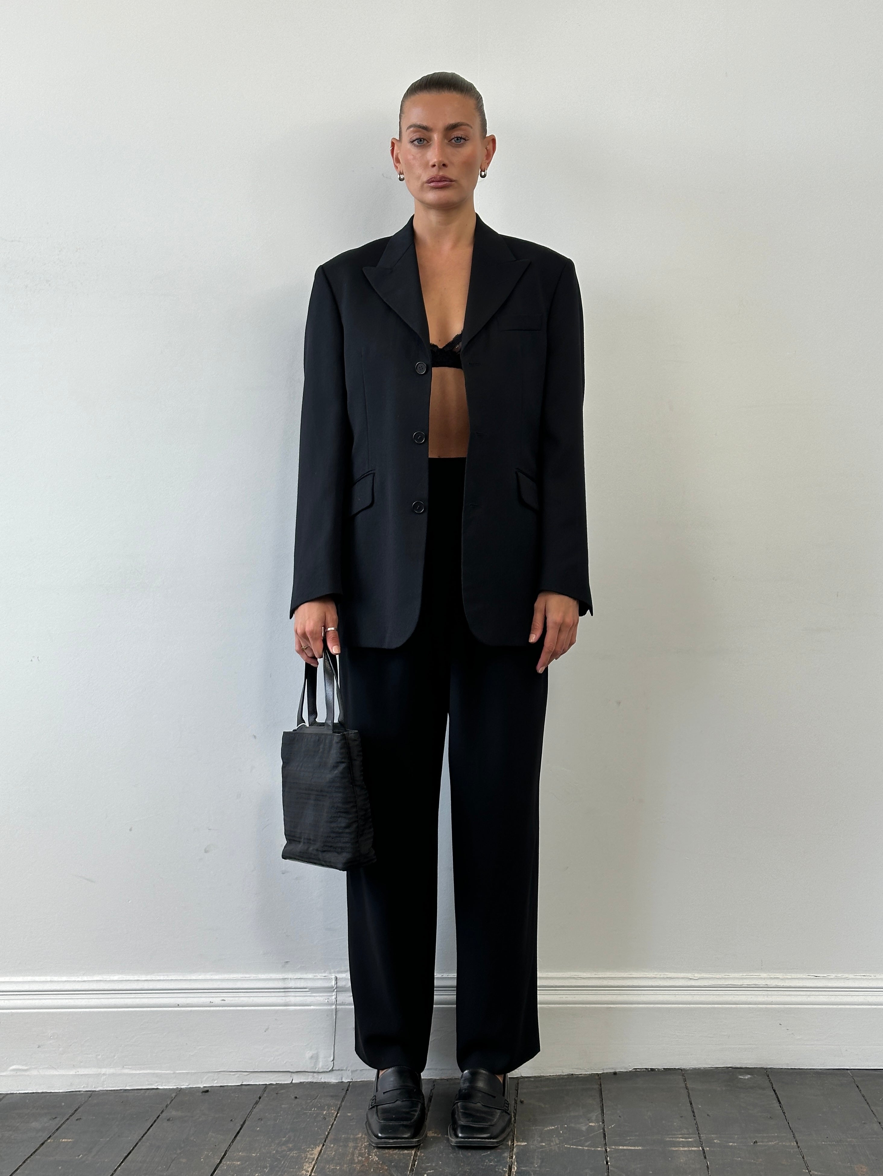Giorgio Armani 1990s wool wide-leg pleated tailored trousers, size W26, in a classic tailored fit with a high waist and elegant pleats.