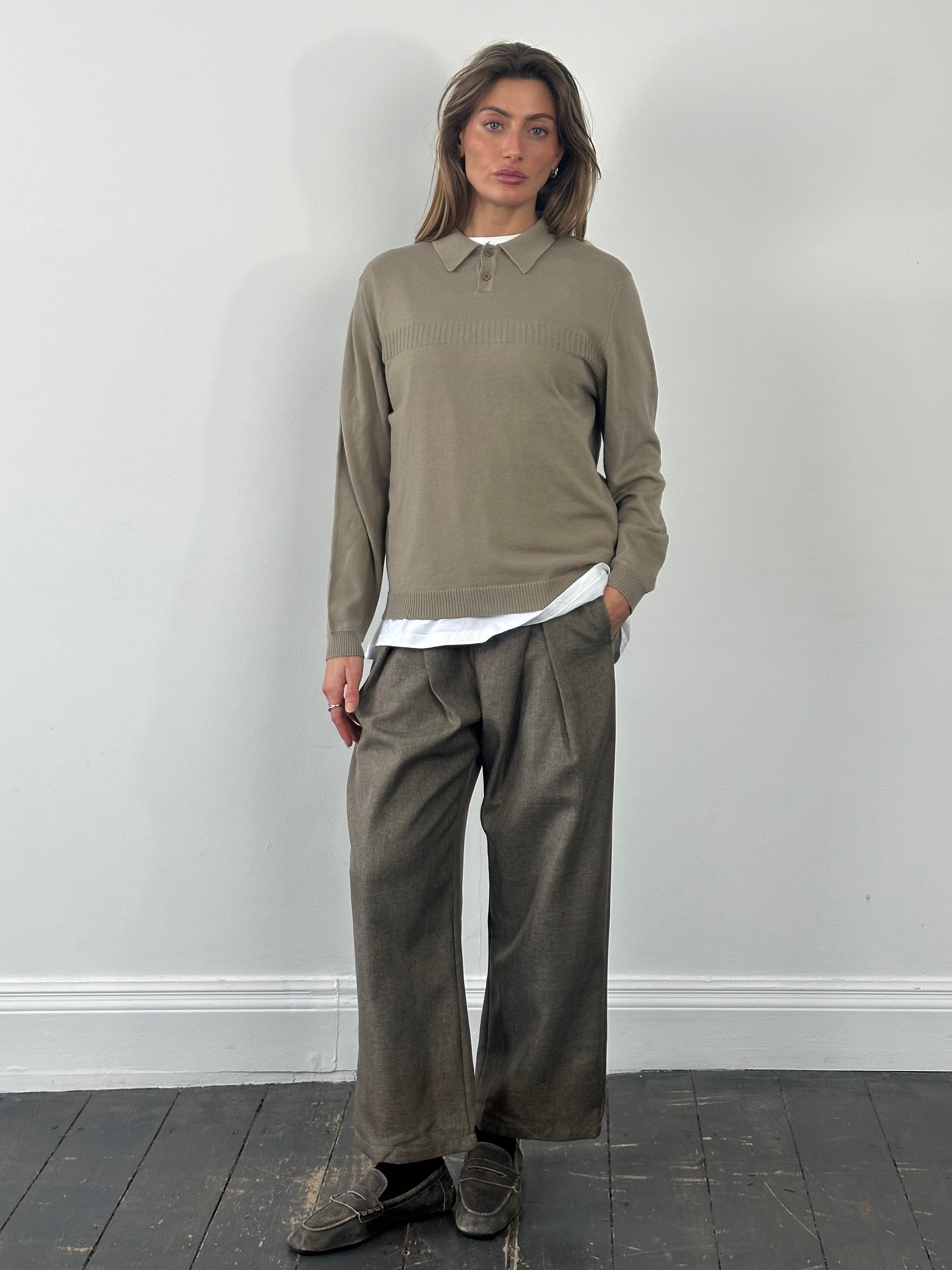 Yves Saint Laurent 1990s wool knit logo jumper in size M, featuring classic design and textured fabric.