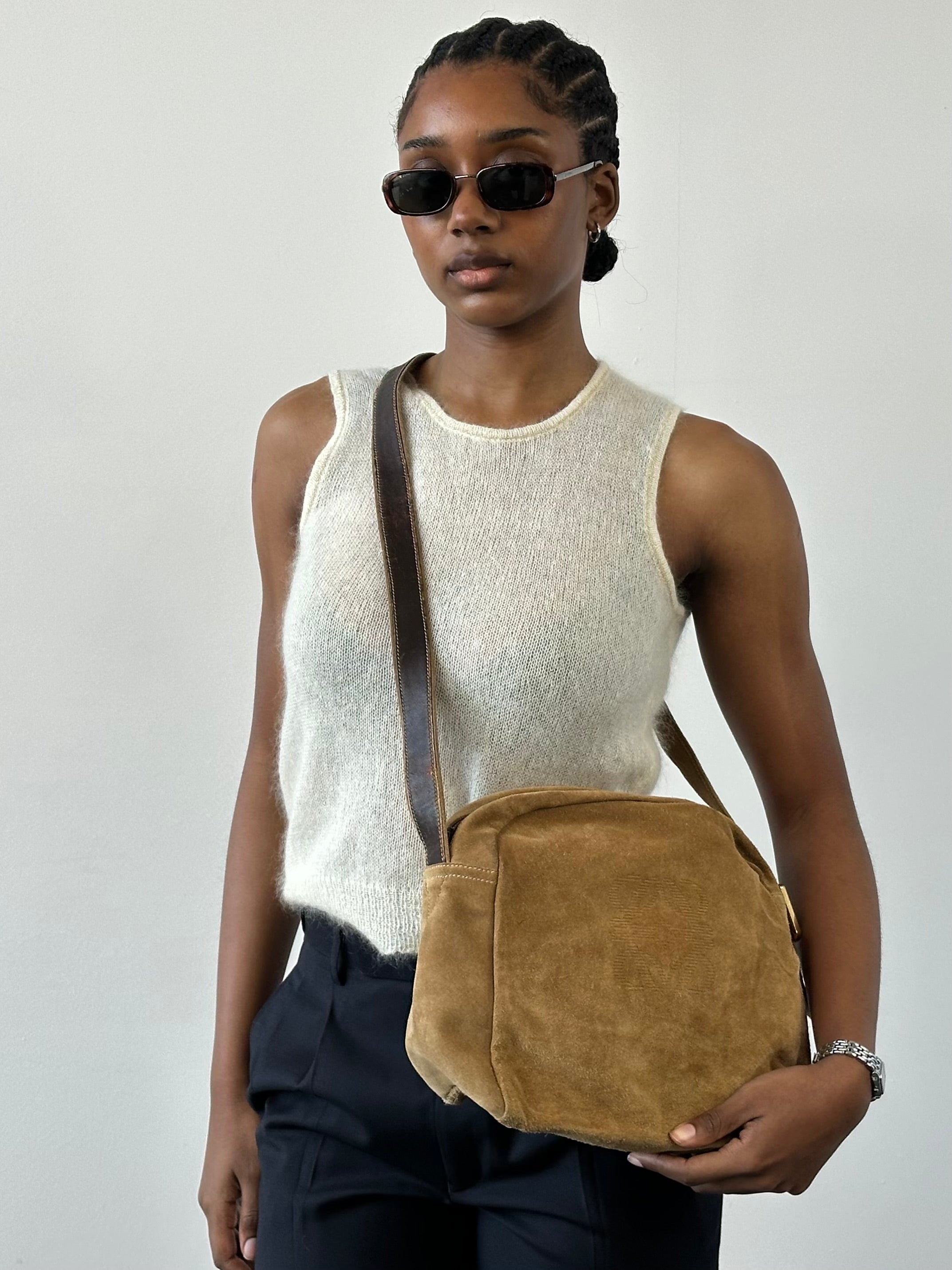 Italian Vintage 1990s mohair knit top, short-sleeve design in soft beige with ribbed texture, size small.