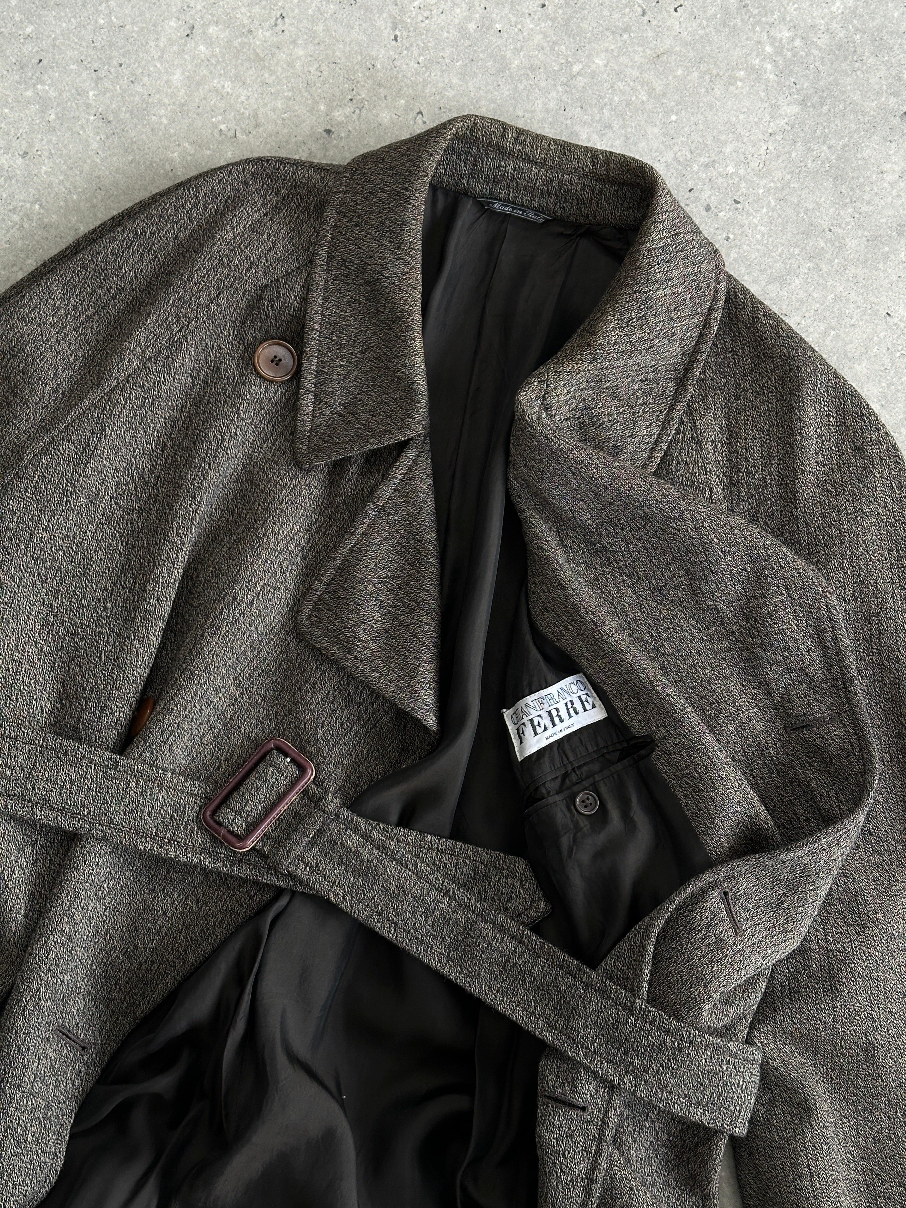 Gianfranco Ferre wool cashmere double-breasted belted trench coat in XL, shown on a hanger with a classic design and neutral color.