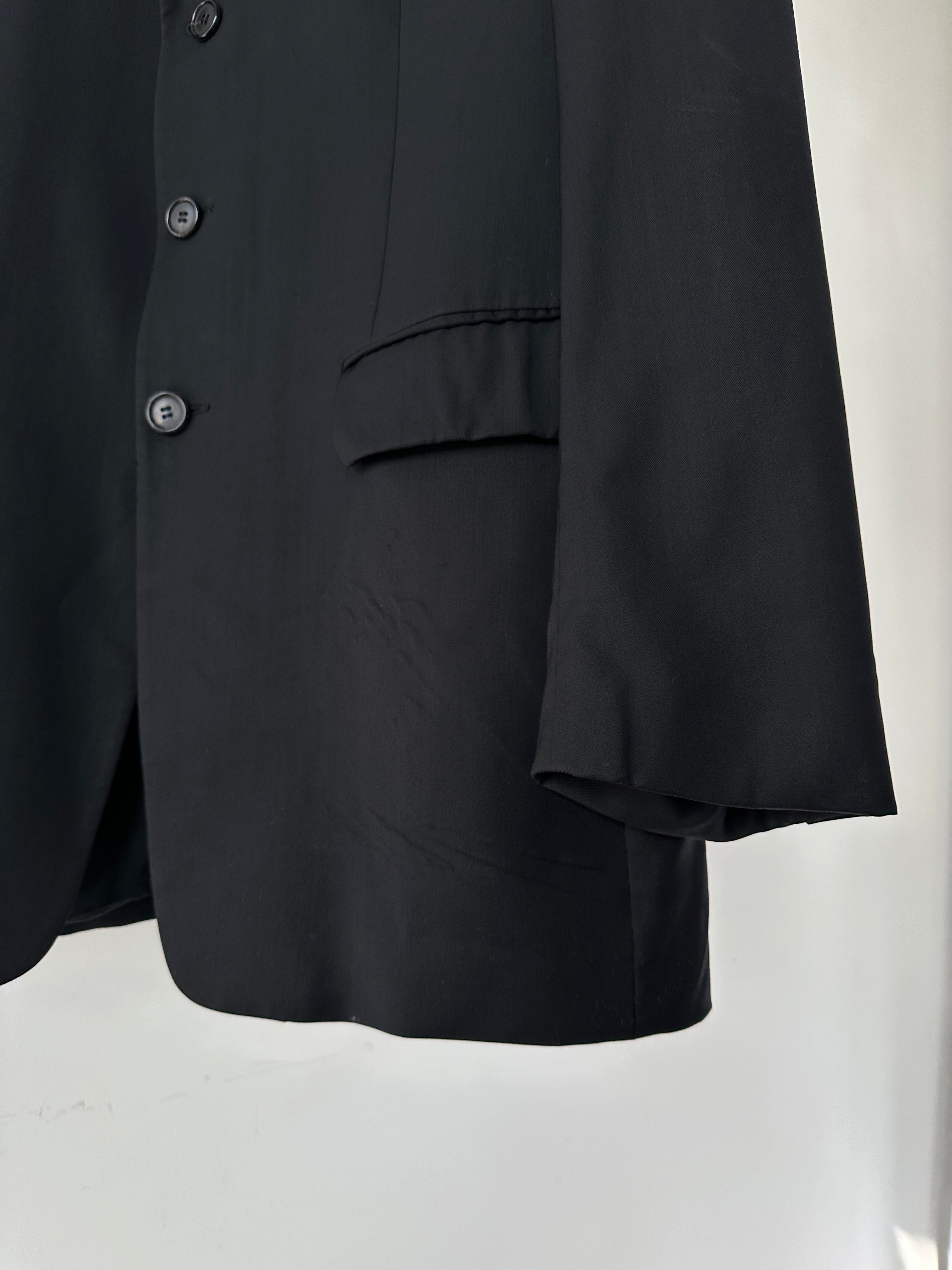 Prada virgin wool jumpsuit with mid-rise waist, single-breasted design, in size 40L/W28, tailored fit with clean lines.