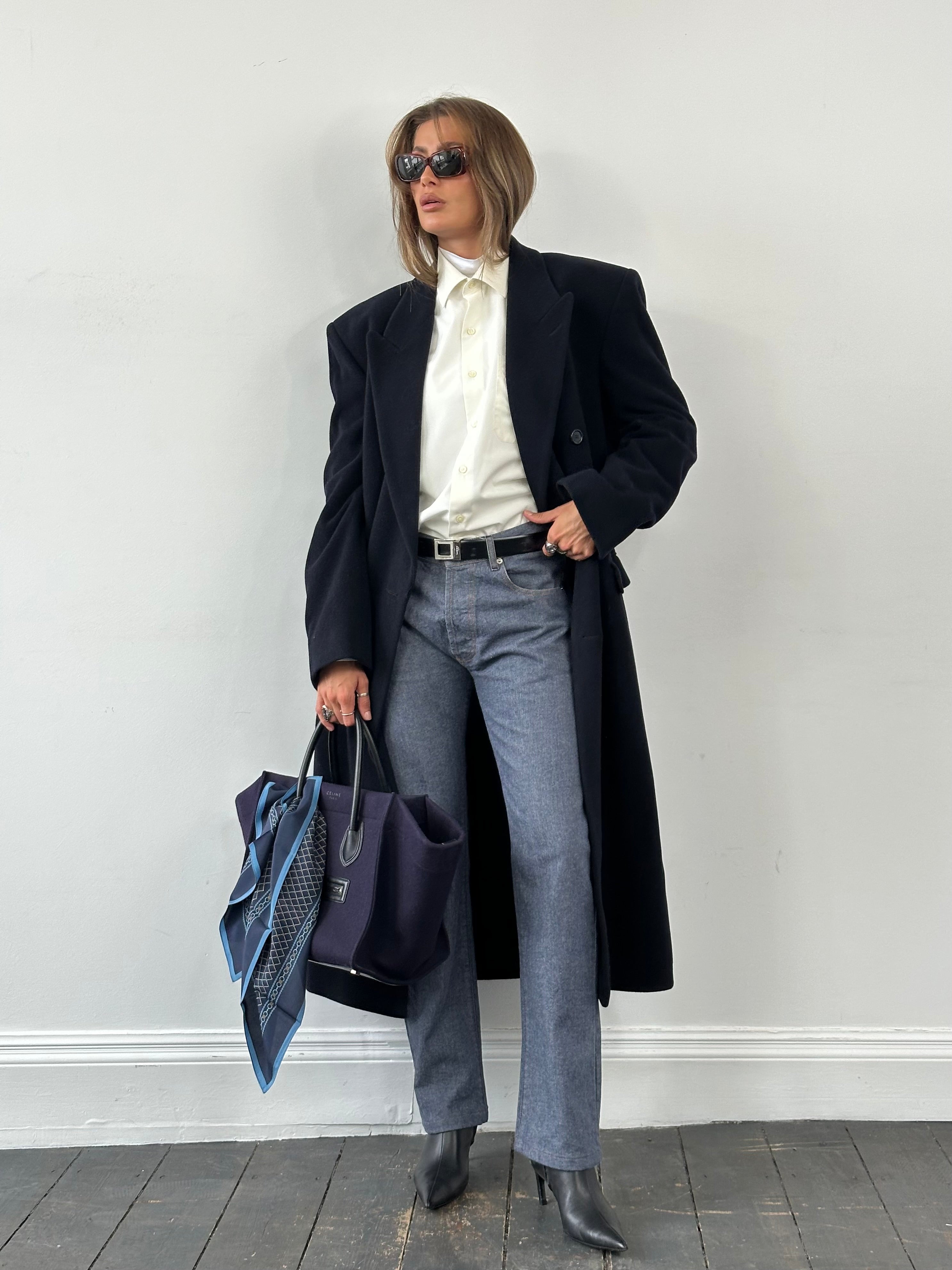 Fiorucci 1990s Safety Jean high-waisted straight-leg denim jeans in W32, showing classic blue denim with front pockets and belt loops.