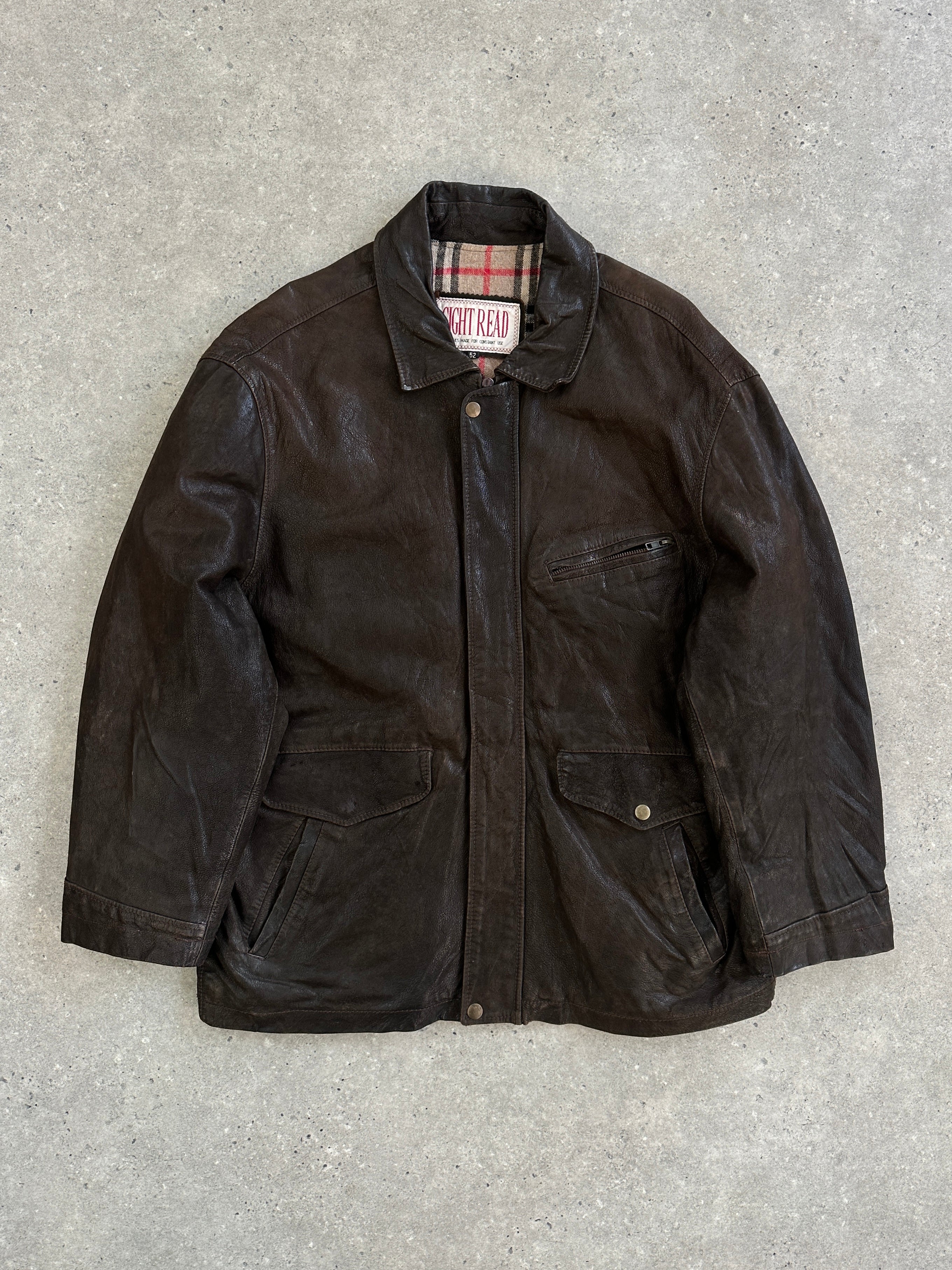 Vintage 1980s leather jacket with concealed placket, L/XL size, featuring classic design and authentic leather material.