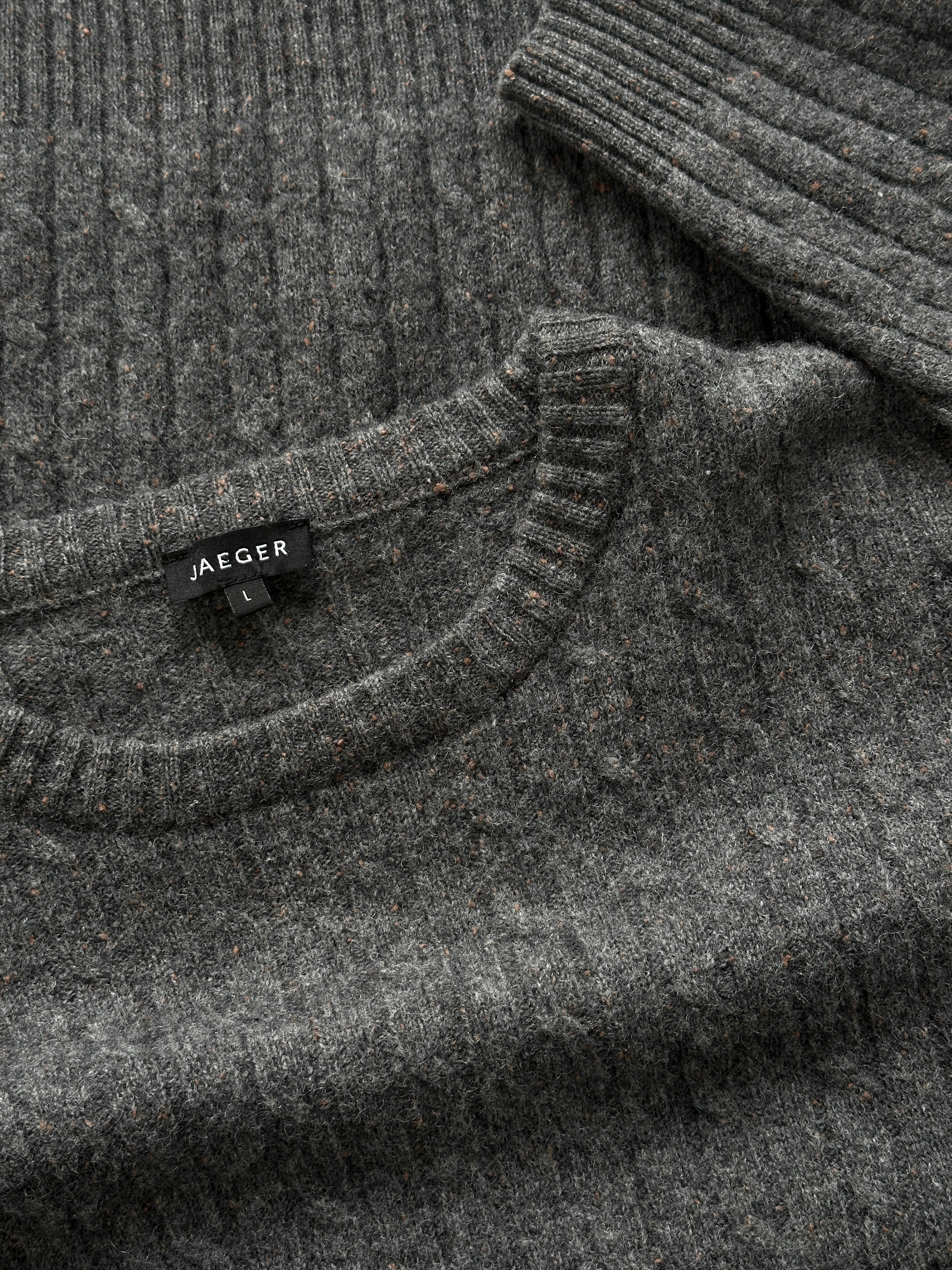 Jaeger wool speckle knit jumper in size L featuring a cozy, textured design with speckled pattern and ribbed cuffs.