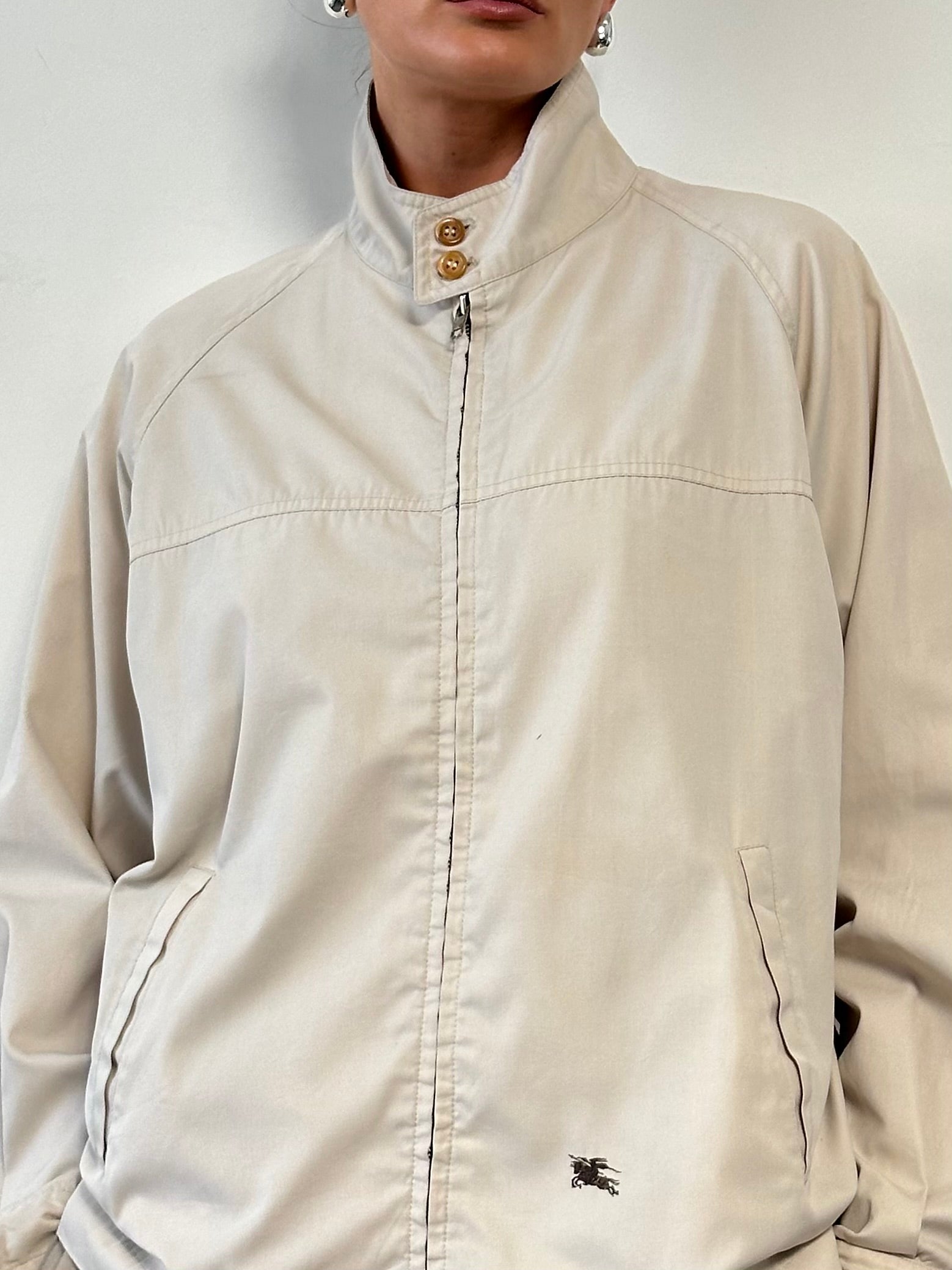 Burberry Nova Check logo bomber jacket in size L, showcasing the classic check pattern and stylish design.