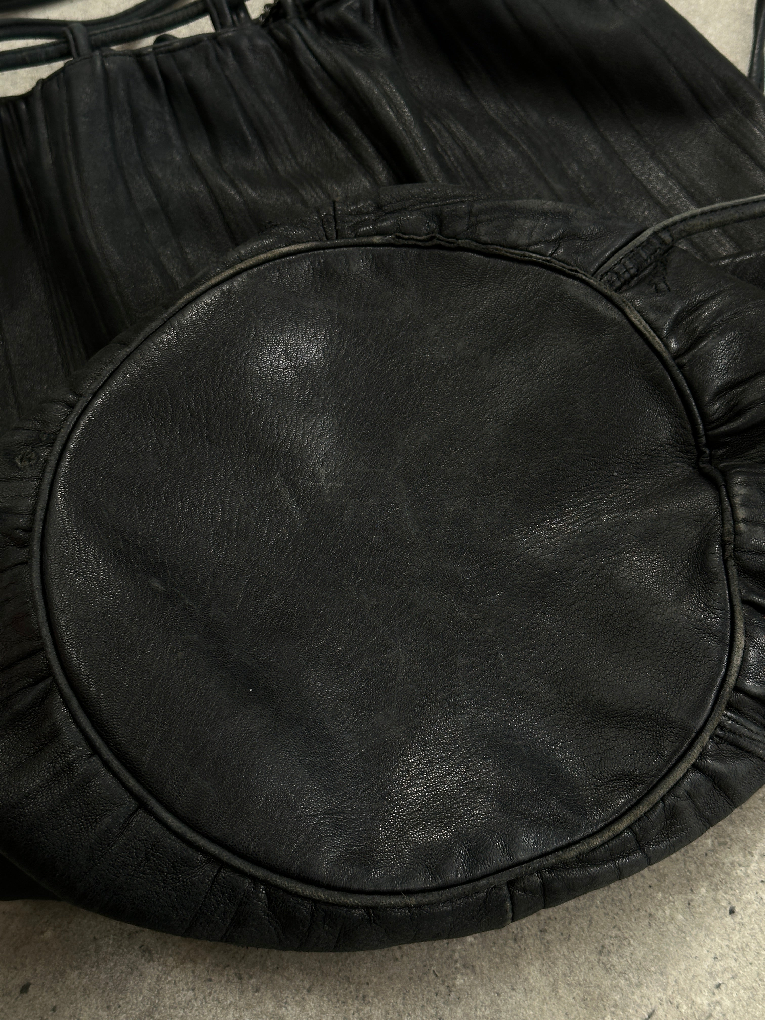 Giorgio Armani Le Collezioni leather rucksack bag with sleek design and adjustable straps, showcasing premium craftsmanship.