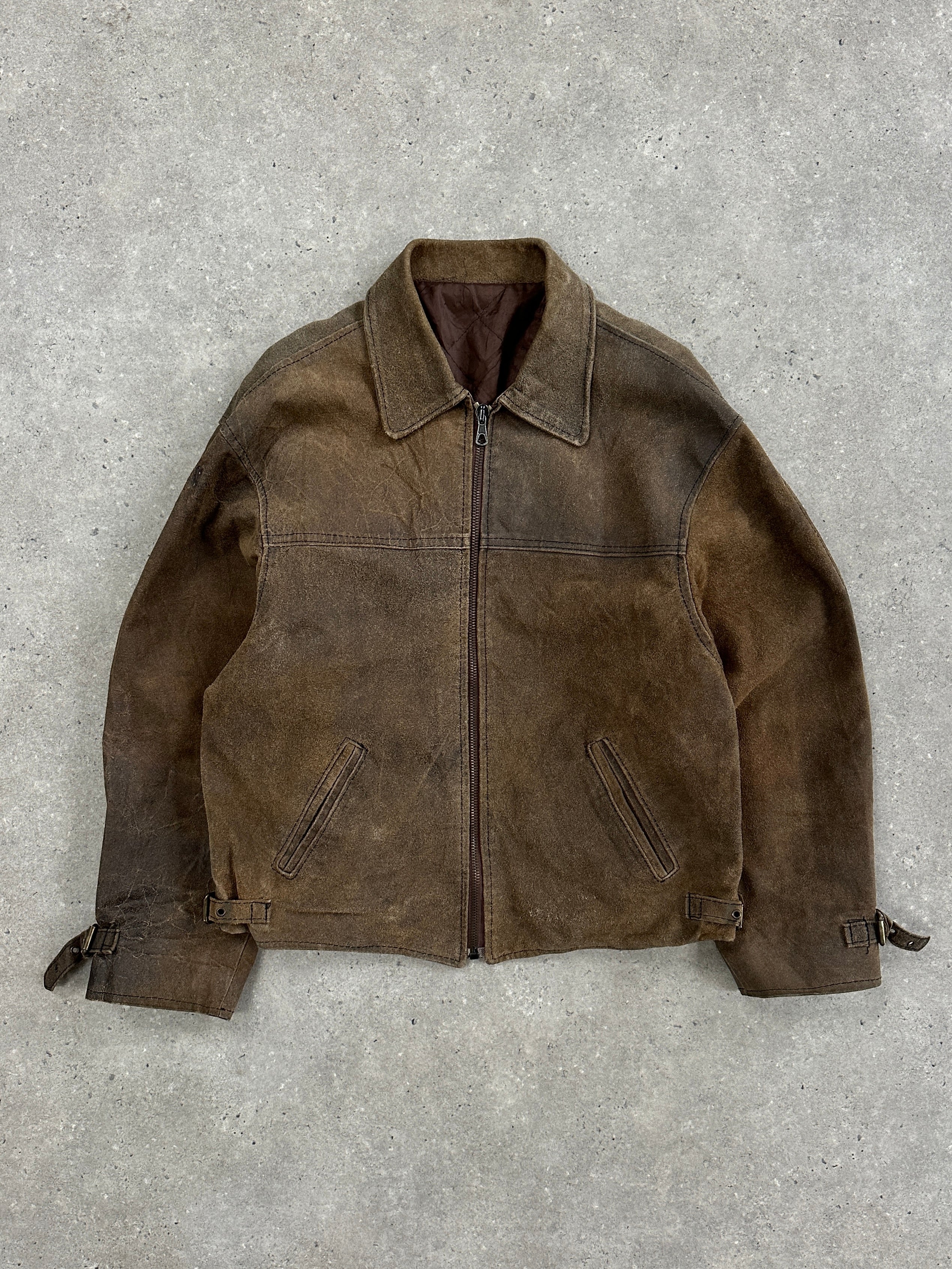 Vintage 1980s boxy leather jacket in XL size, featuring classic design and worn leather texture.